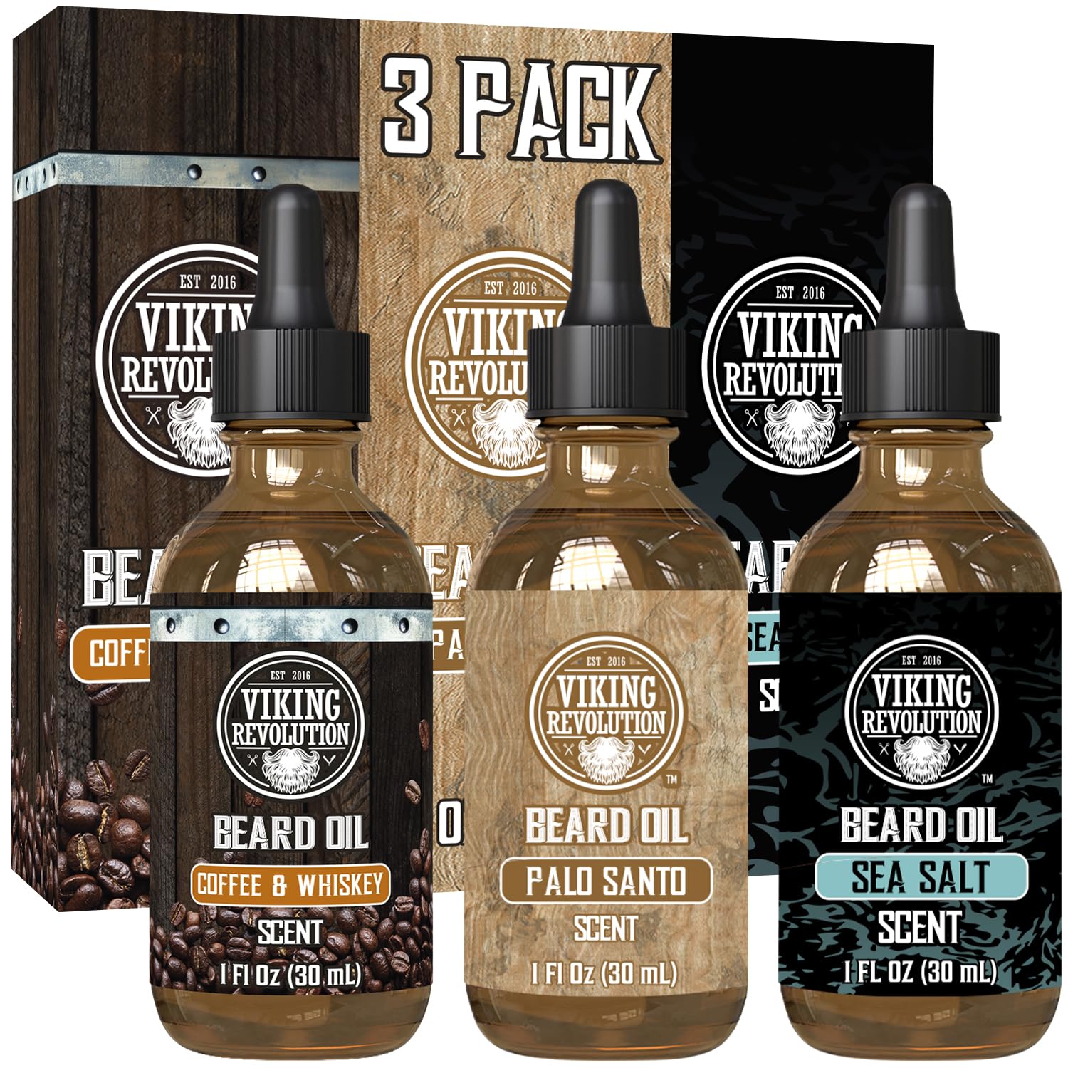 Three bottles of beard oil in Coffee & Whiskey, Palo Santo, and Sea Salt signature scents.