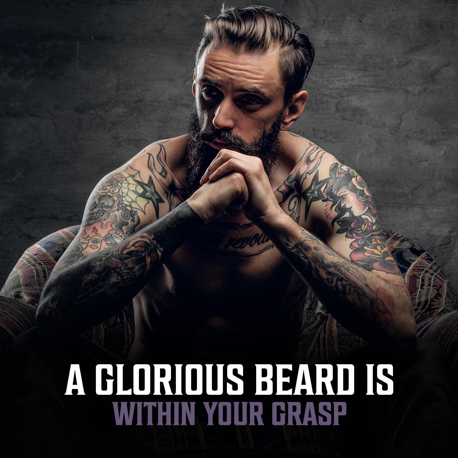 Tattooed, bearded man sits with hands clasped; text: Clary Sage Beard Oil is within your grasp.
