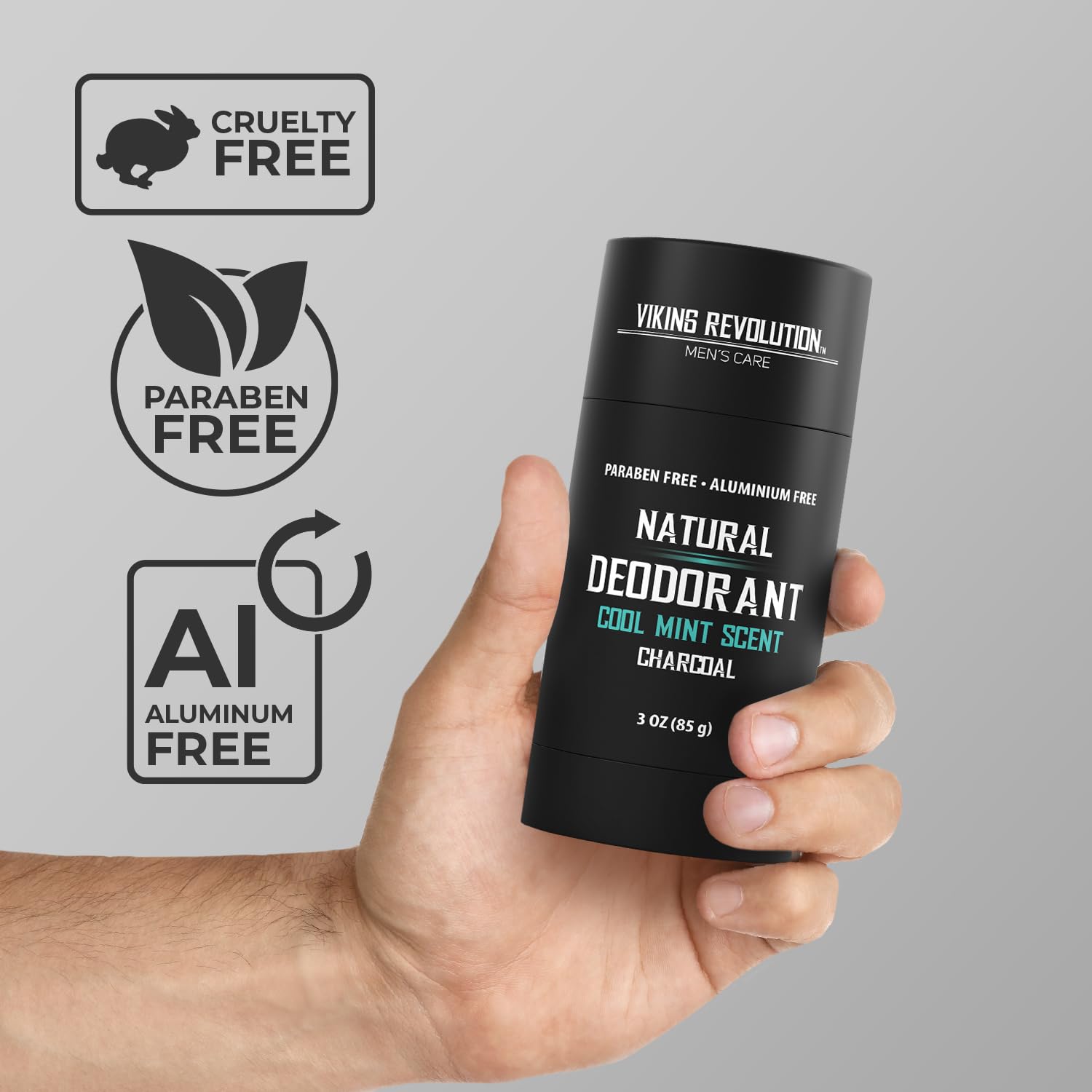 Hand holding Cool Mint Deodorant for Men with cruelty-free and paraben-free icons.