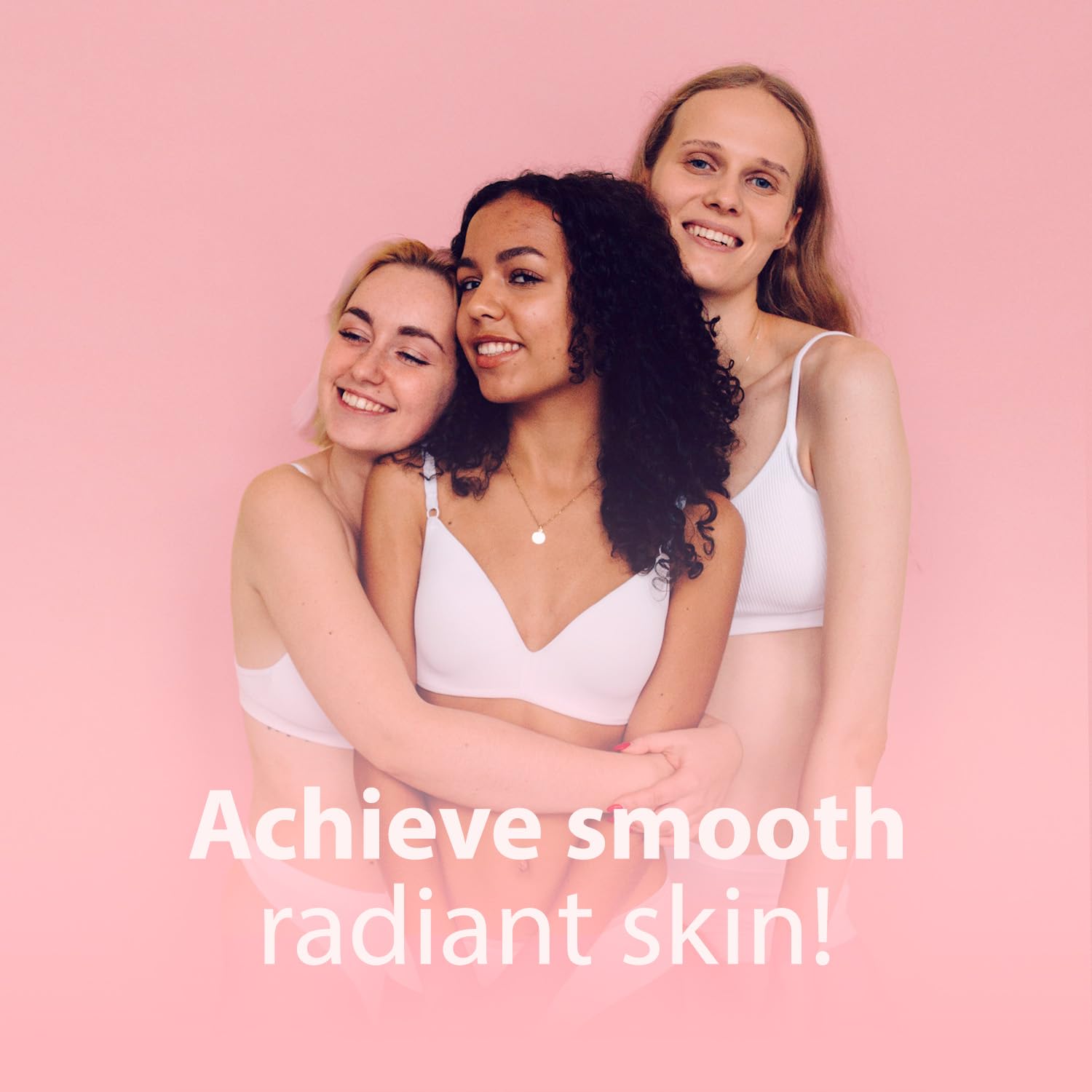 Three women in white clothing smiling and embracing, with the text Achieve smooth radiant skin using Ingrown Hair Pads with salicylic acid!