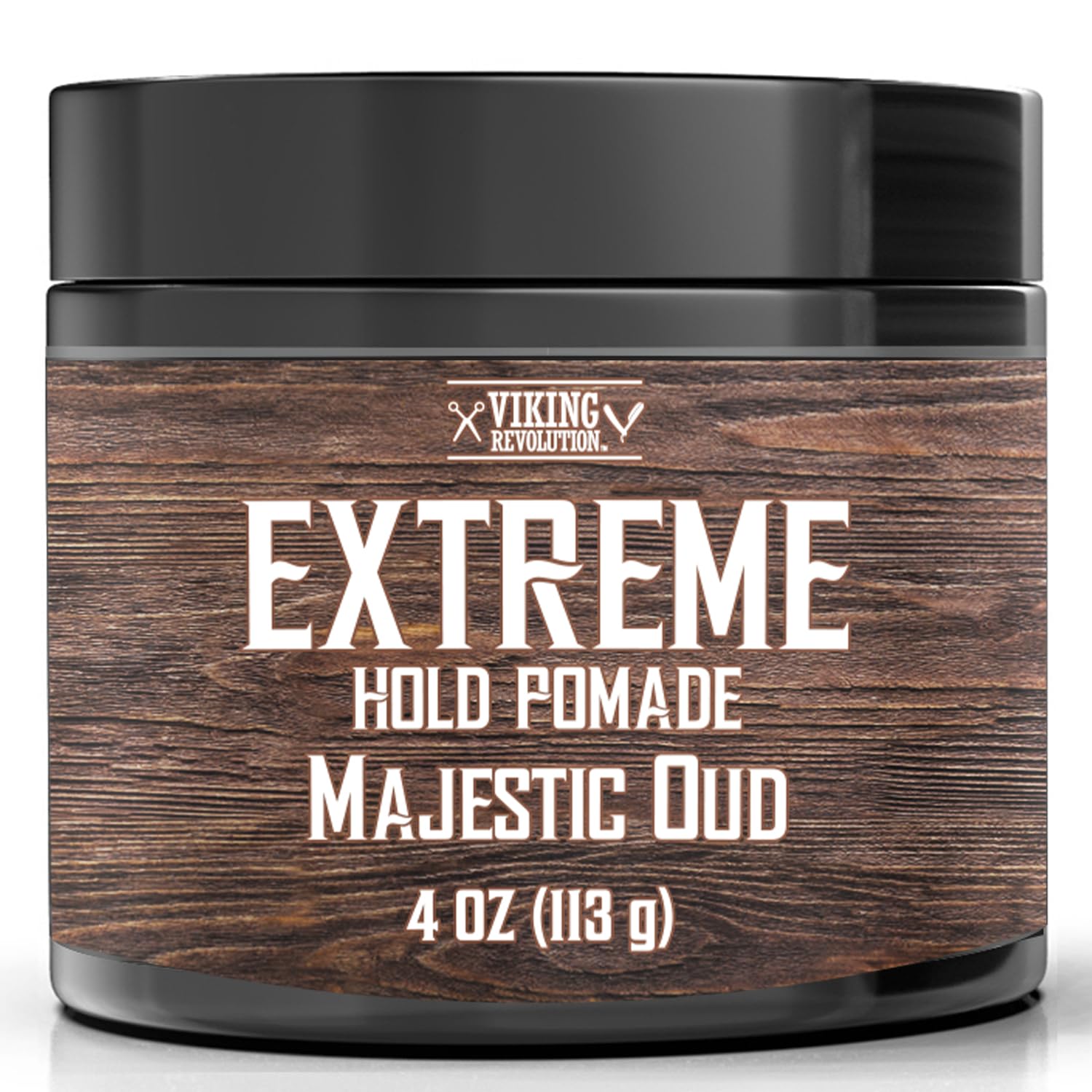 Black jar of New Scents Hair Pomade, Majestic Oud, 4 oz (113 g), on wooden background, promising an extreme hold with a high-shine finish.