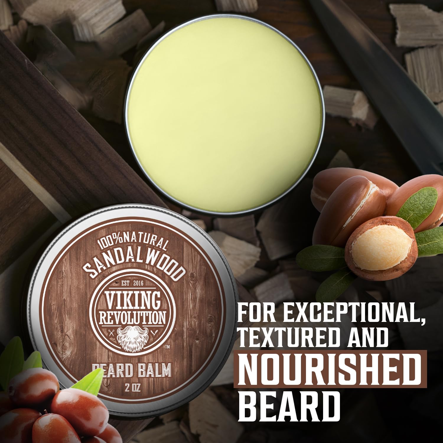 The Beard Balm - Sandalwood Scent (2oz) tin and its ingredients are displayed on a wooden surface, highlighting its all-natural formula. This balm helps nourish beards and effectively combats beardruff.