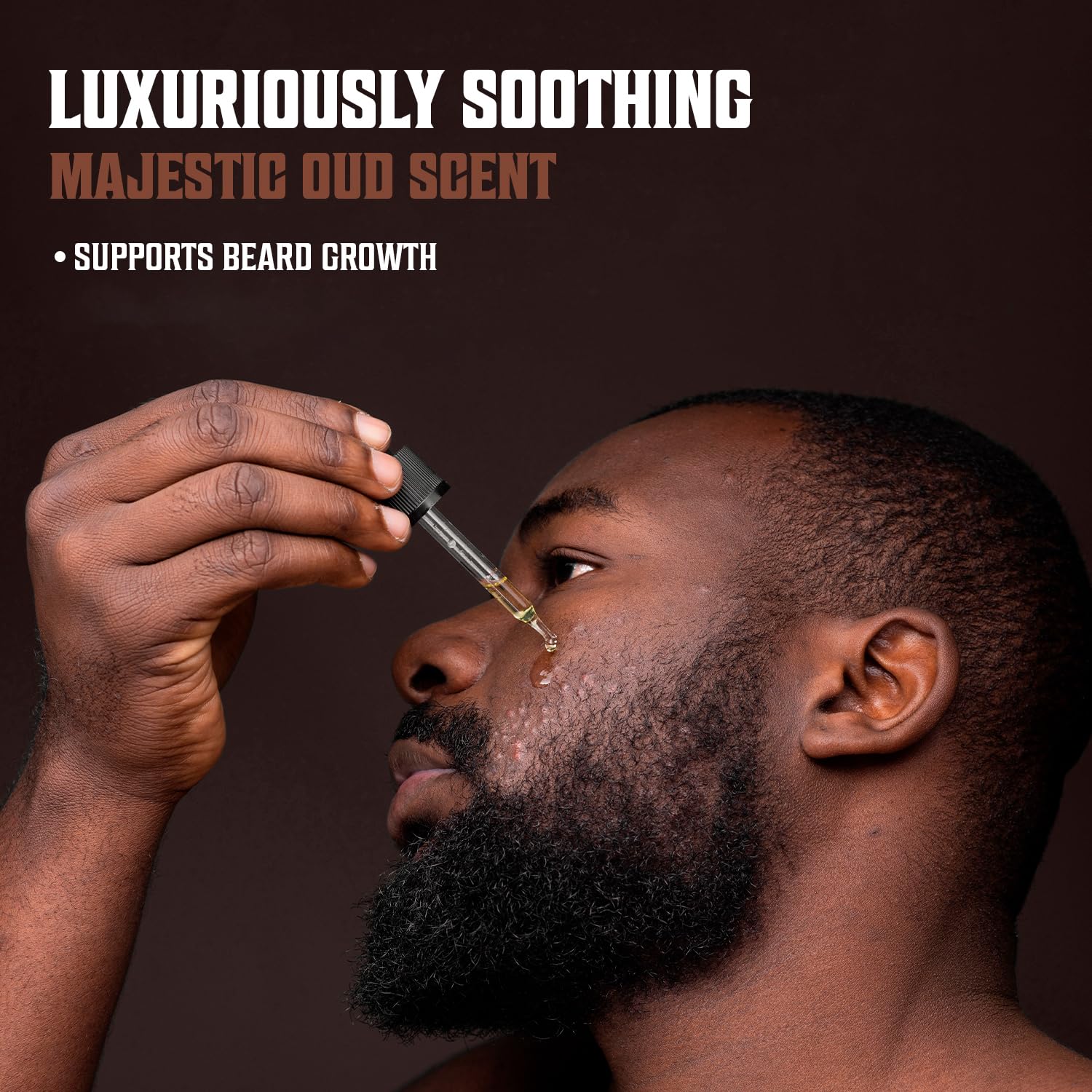 A man applies Majestic Oud Beard Oil with a dropper; the text reads: Luxuriously Soothing, Majestic Oud Scent, Supports Beard Growth. Infused with Argan and Jojoba for natural beard care.