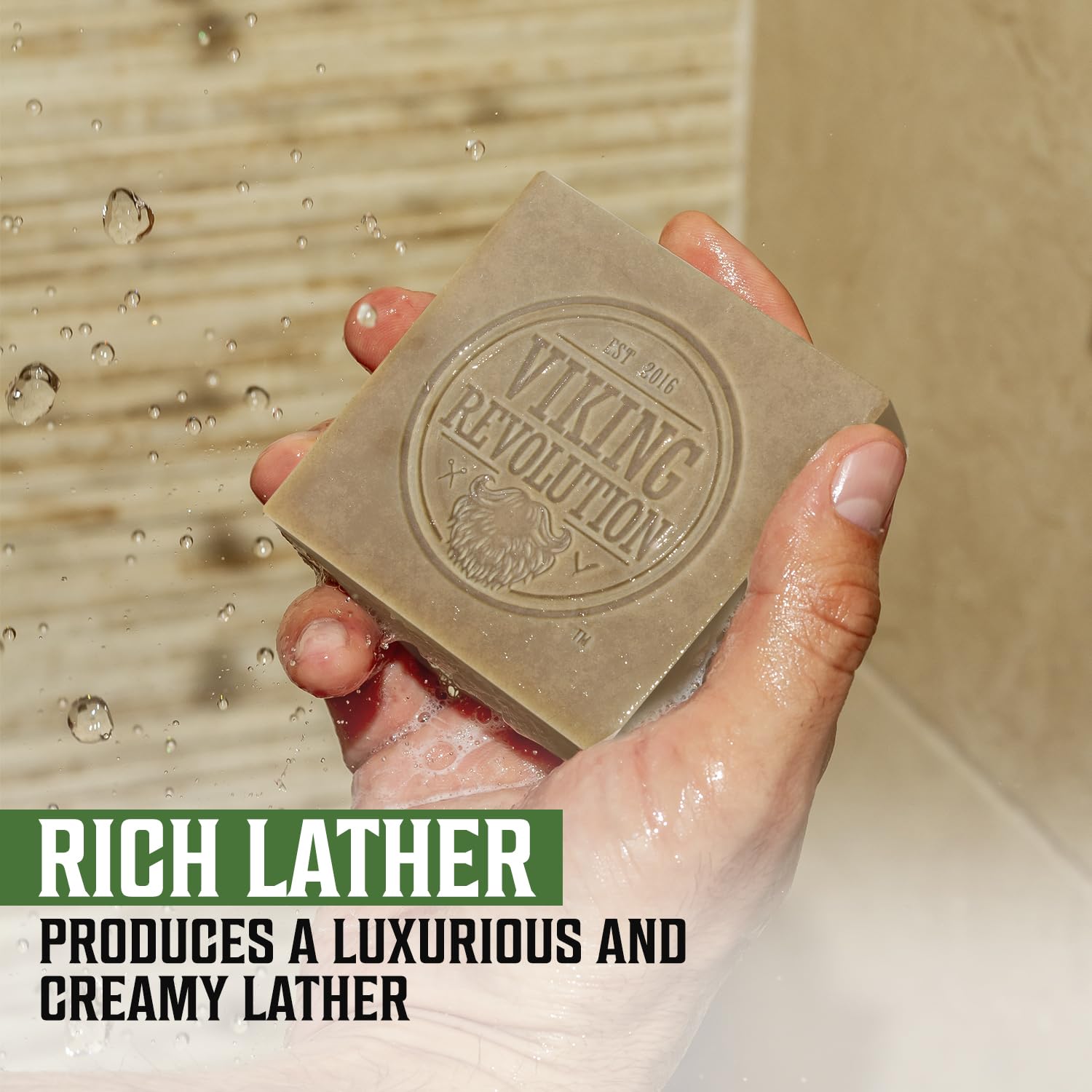 Hand under running water with Vetiver Natural Soap for Men, text about the rich and creamy lather.