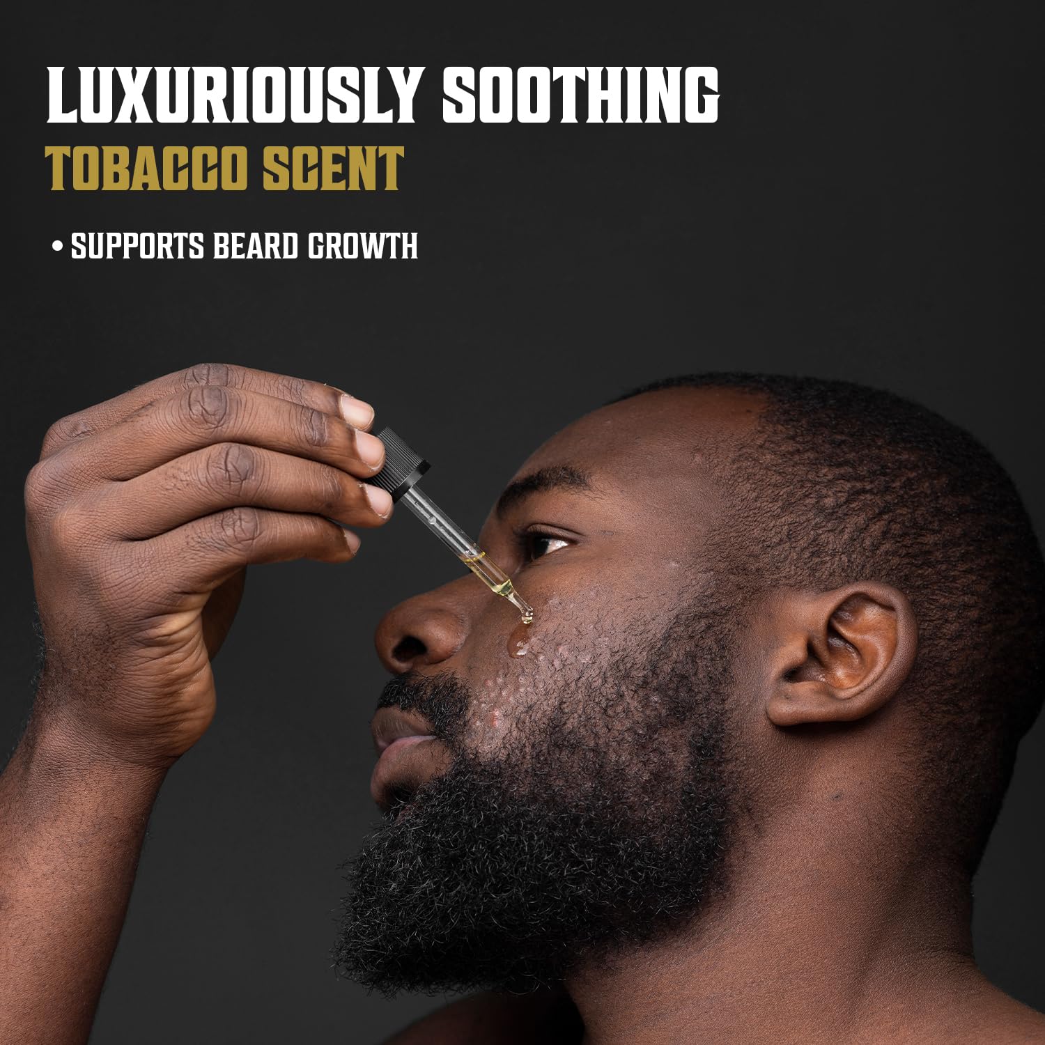 A man applying the Tobacco Beard Oil for Men with a dropper; text reads Luxuriously Soothing Sweet Tobacco Scent, perfect for Taming Stubborn Facial Hair.