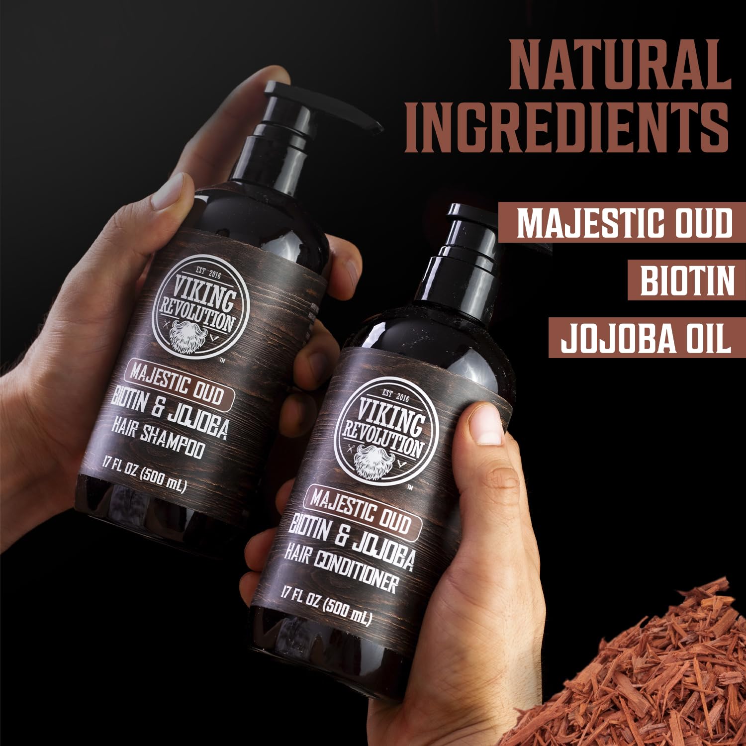 Hands holding Majestic Oud Hair Shampoo & Conditioner 17oz; Natural Ingredients text above.