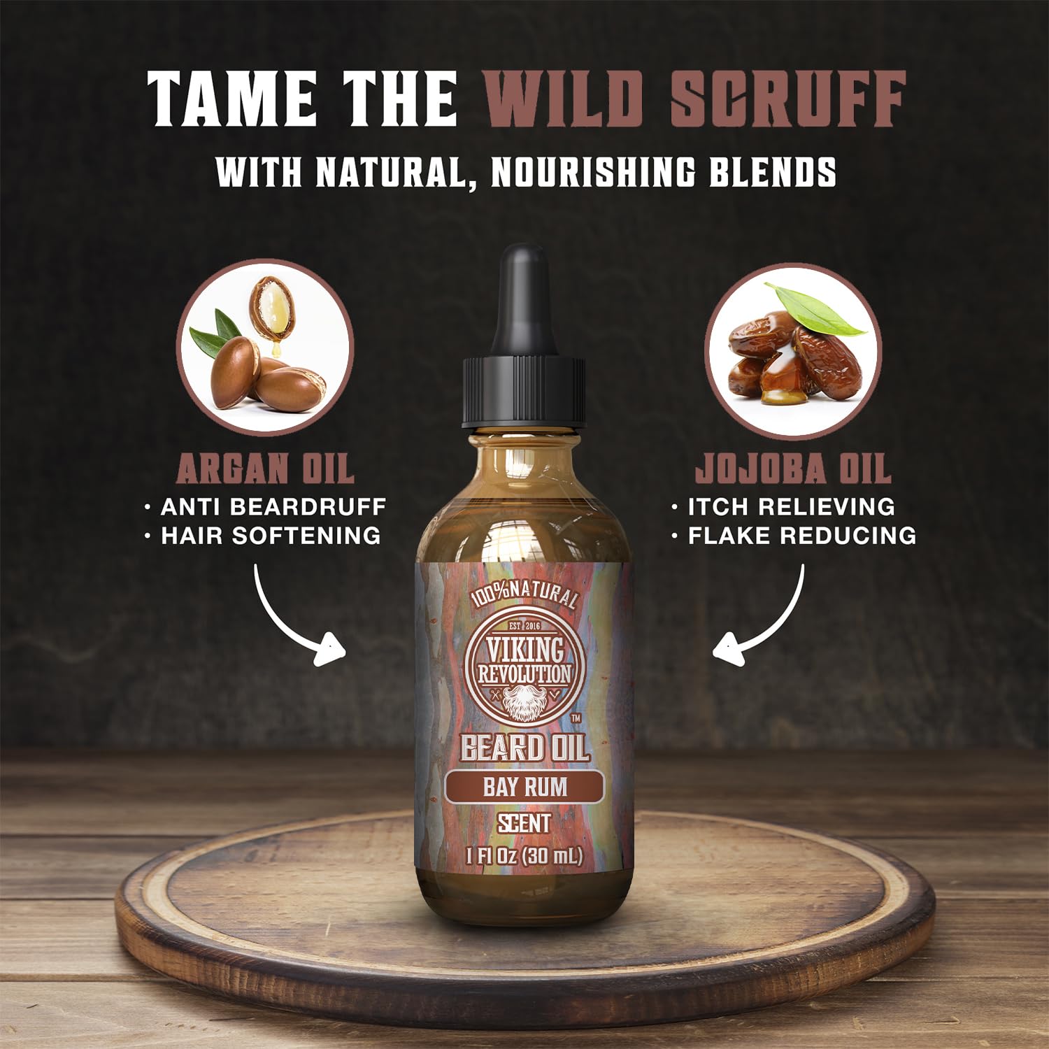 The Bay Rum Beard Oil bottle, featuring argan and jojoba oil details, rests elegantly on a wooden surface, perfect for ultimate beard maintenance.