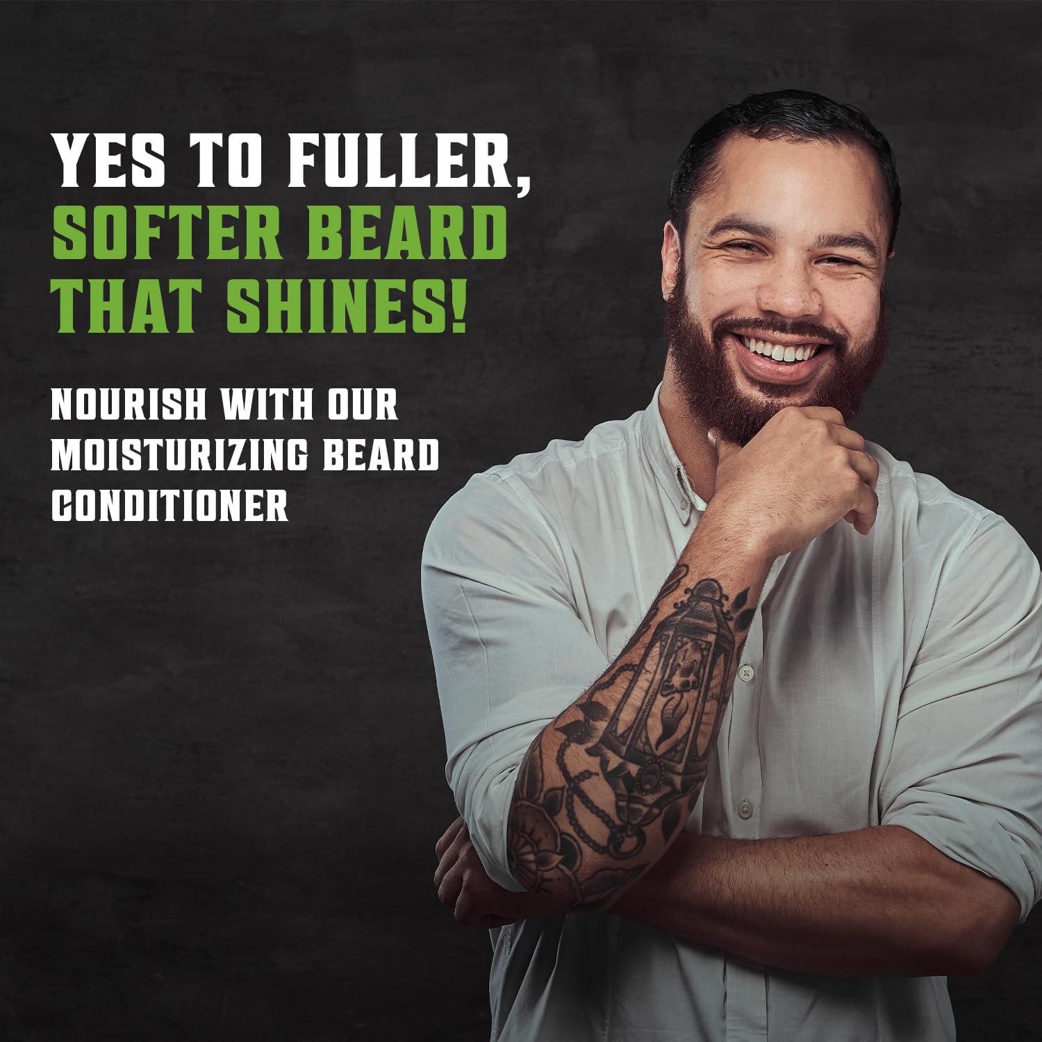 A man with a beard smiles confidently, promoting the Tea Tree Beard Conditioner 17oz, enriched with argan oil for a fuller, softer shine.