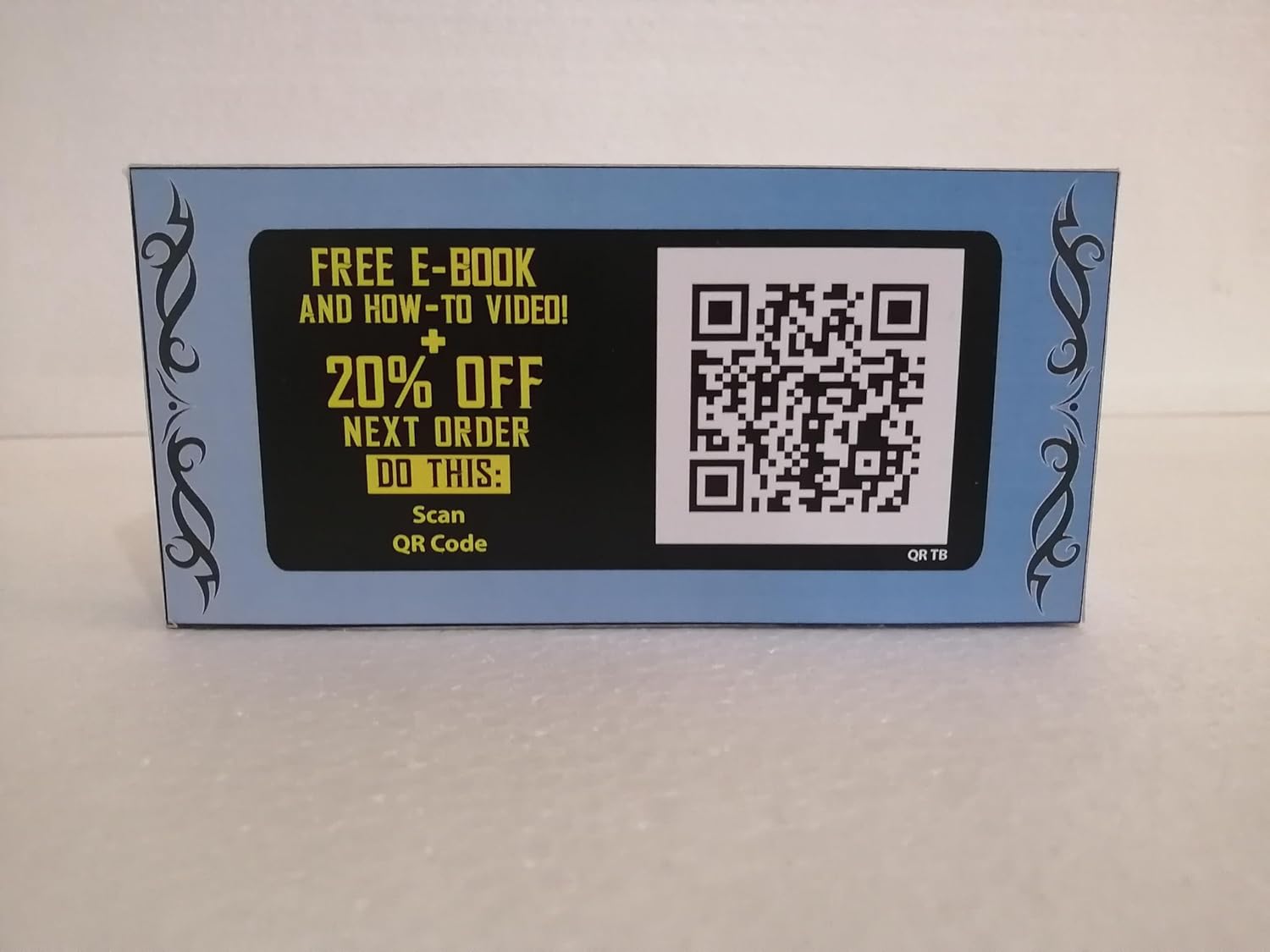 Blue box for Tattoo Care Balm - 2 Pack; scan QR for free e-book, video, and 20% off next order.