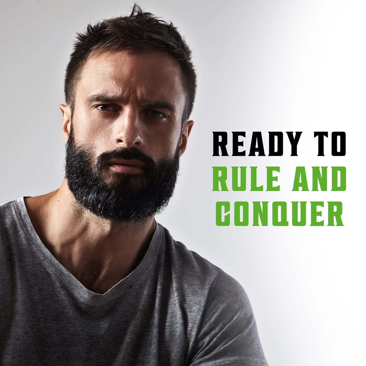 Bearded man in a grey shirt with Ready to Rule and Conquer shows Peppermint & Eucalyptus Beard Set.