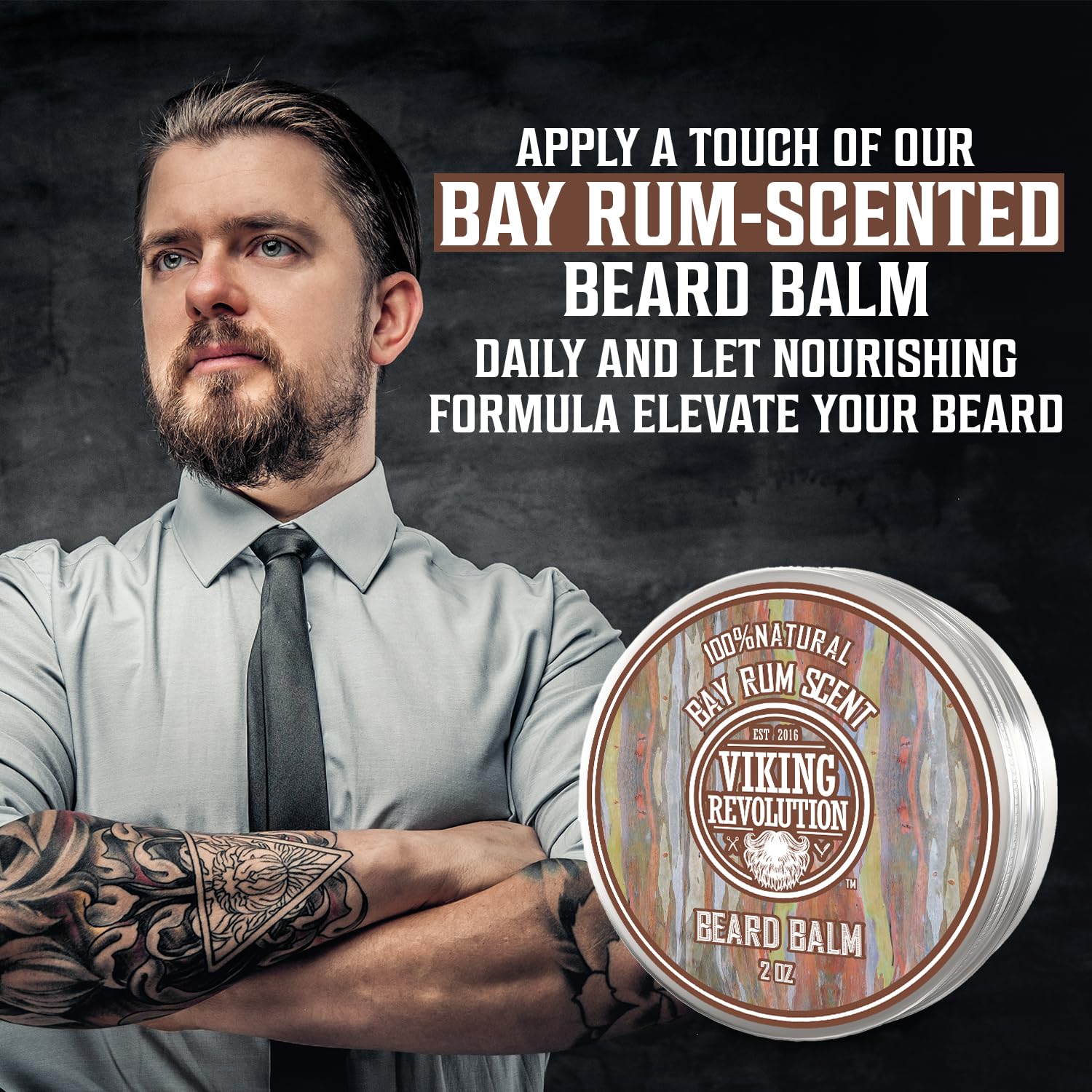 Man with beard stands confidently by a tin of Bay Rum Beard Balm, arms crossed.