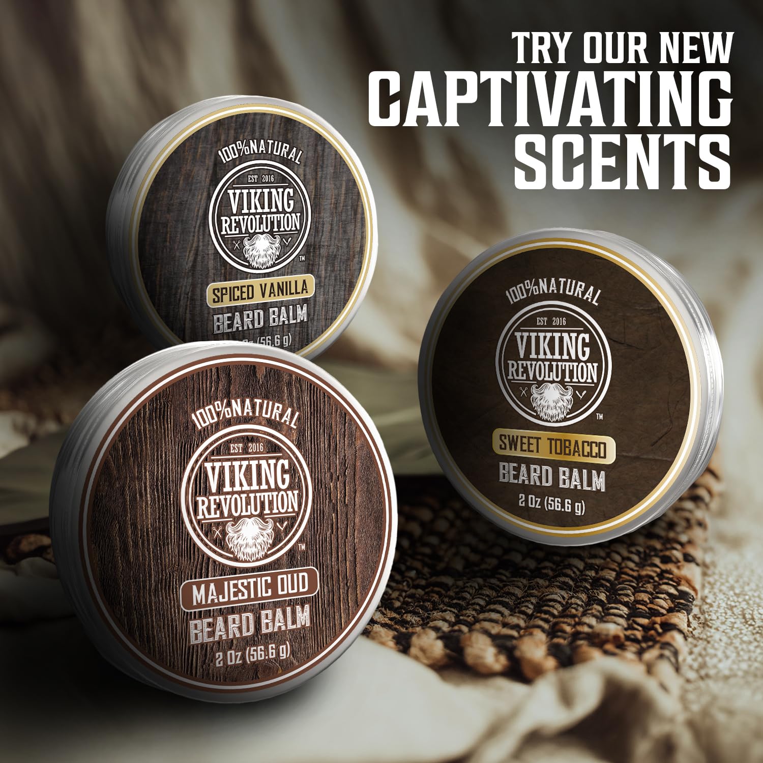 Three tins of Spiced Vanilla Beard Balm 2oz exemplify natural beard care on a tabletop display.