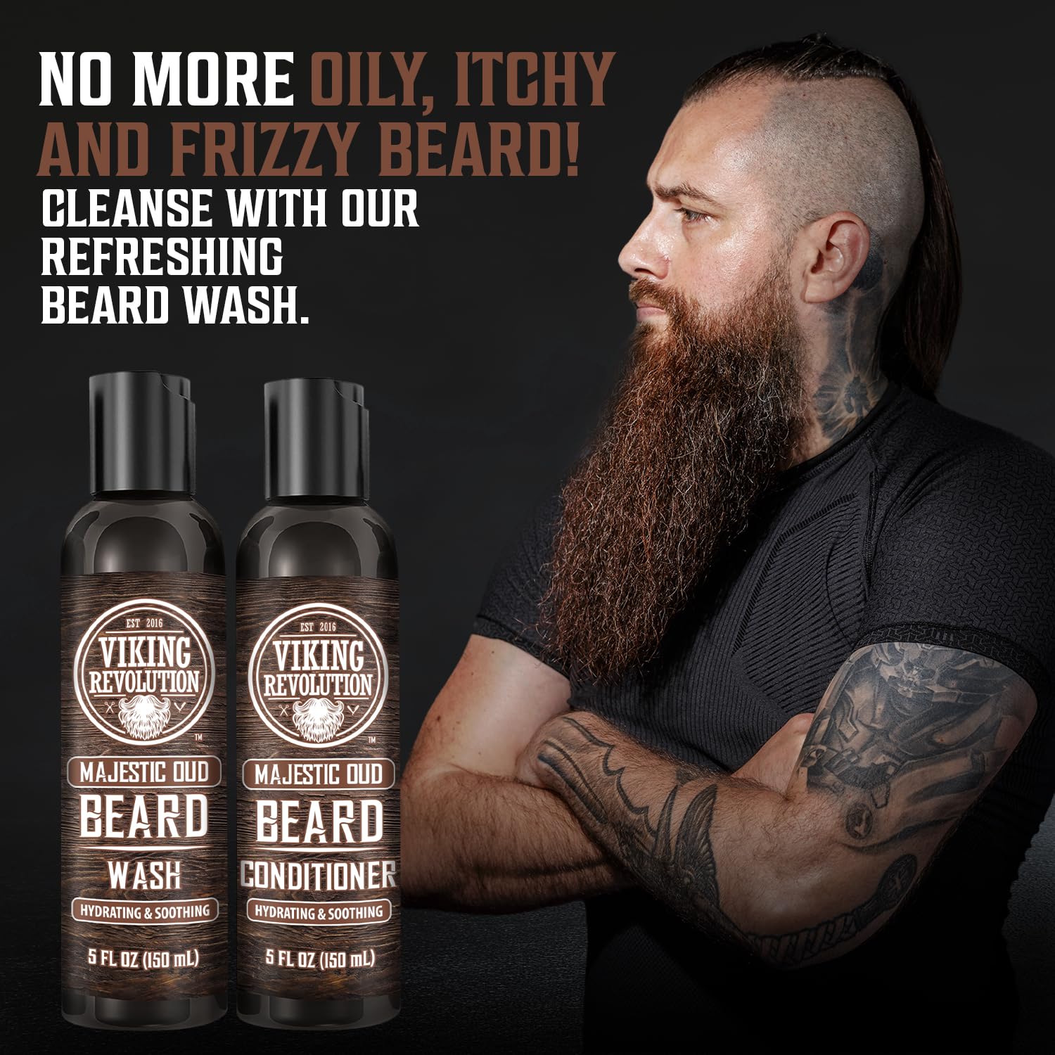 A man with a long beard stands proudly beside bottles of Beard Wash & Conditioner - Majestic Oud 5oz, showcasing his dedication to premium beard care.