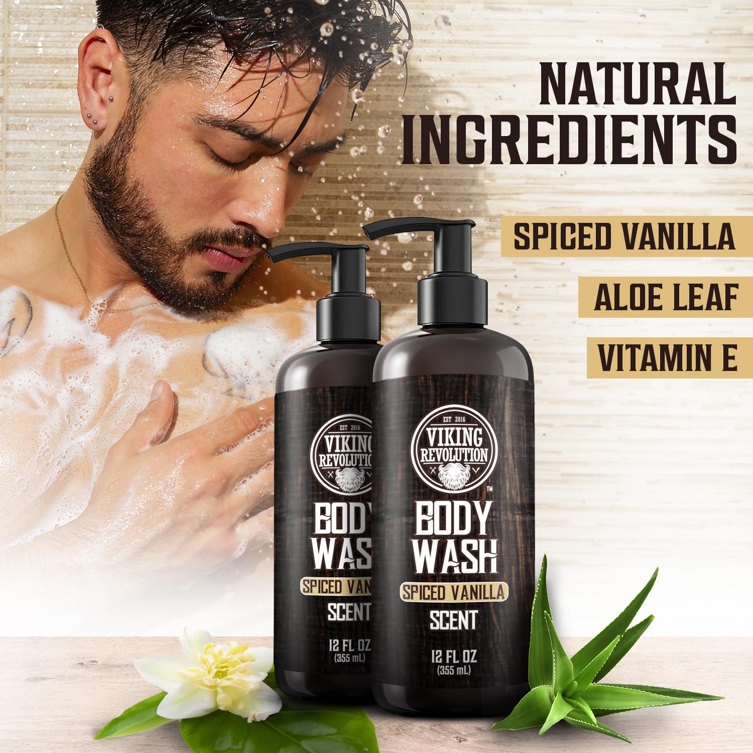 Surrounded by bottles of the Spiced Vanilla 2 pack Body Wash, a man enjoys a refreshing cleanse enhanced by natural ingredients like aloe and floral accents.