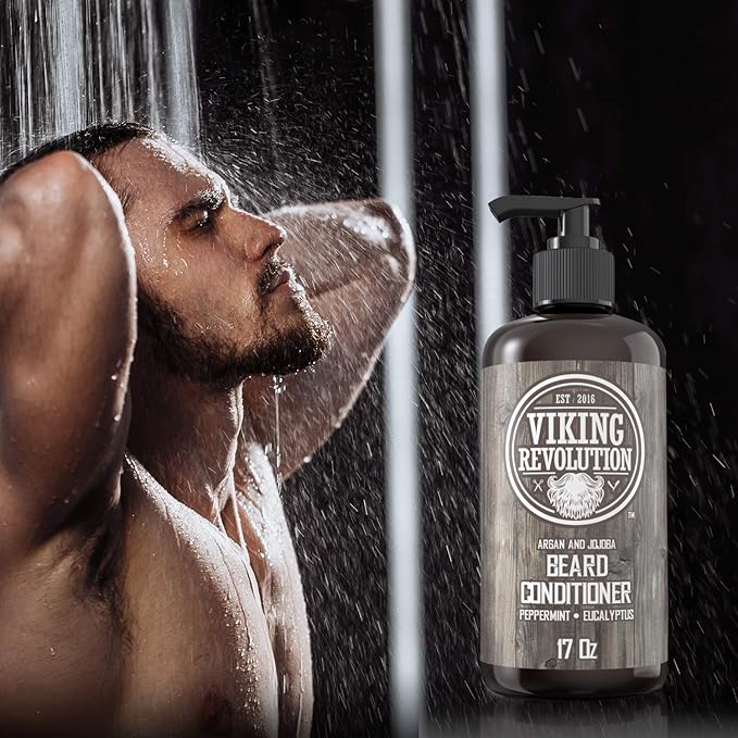 A man showering next to a bottle of Beard Conditioner 17oz, promoting healthy beard growth with its natural blend.