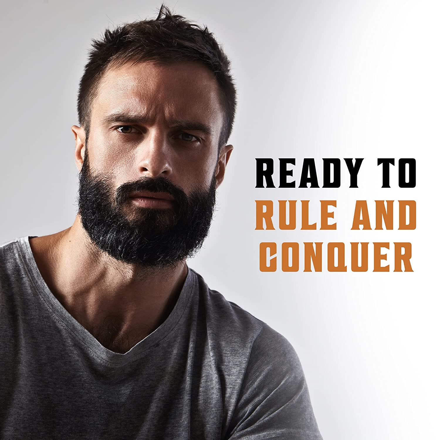 Bearded man in gray shirt: READY TO RULE AND CONQUER—with Viking Revolution Sandalwood Beard Set.