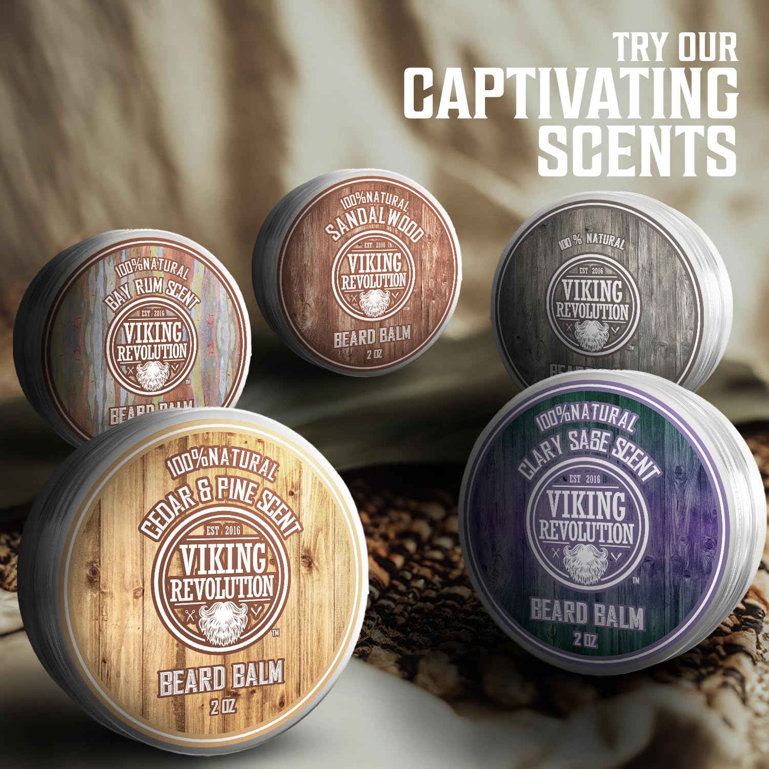 Five tins of Cedar & Pine Beard Balm by Viking Revolution, crafted with organic ingredients and various scents, designed to nourish and moisturize your beard.