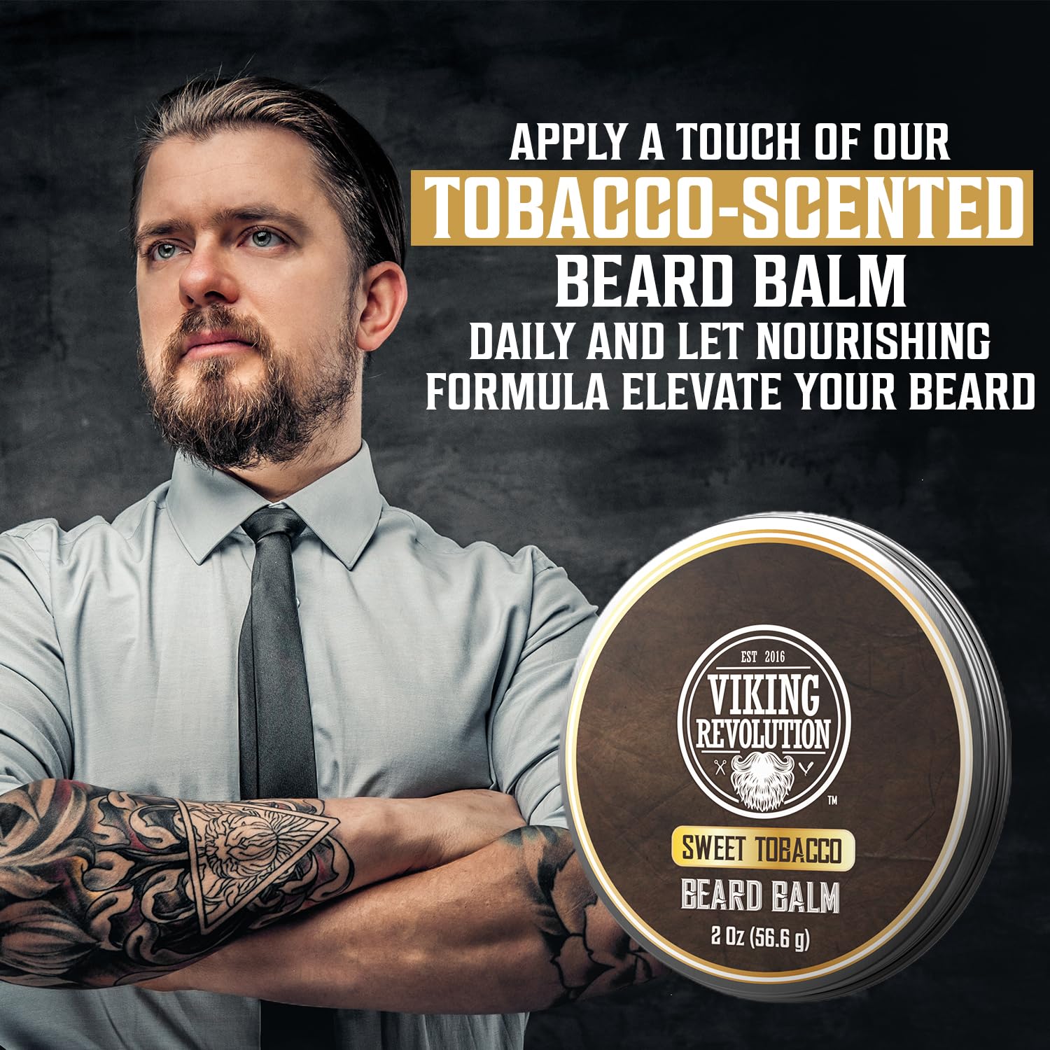 A tattooed man with a rugged beard is promoting the Tobacco Beard Balm for Men 1 pack from Viking Revolution.
