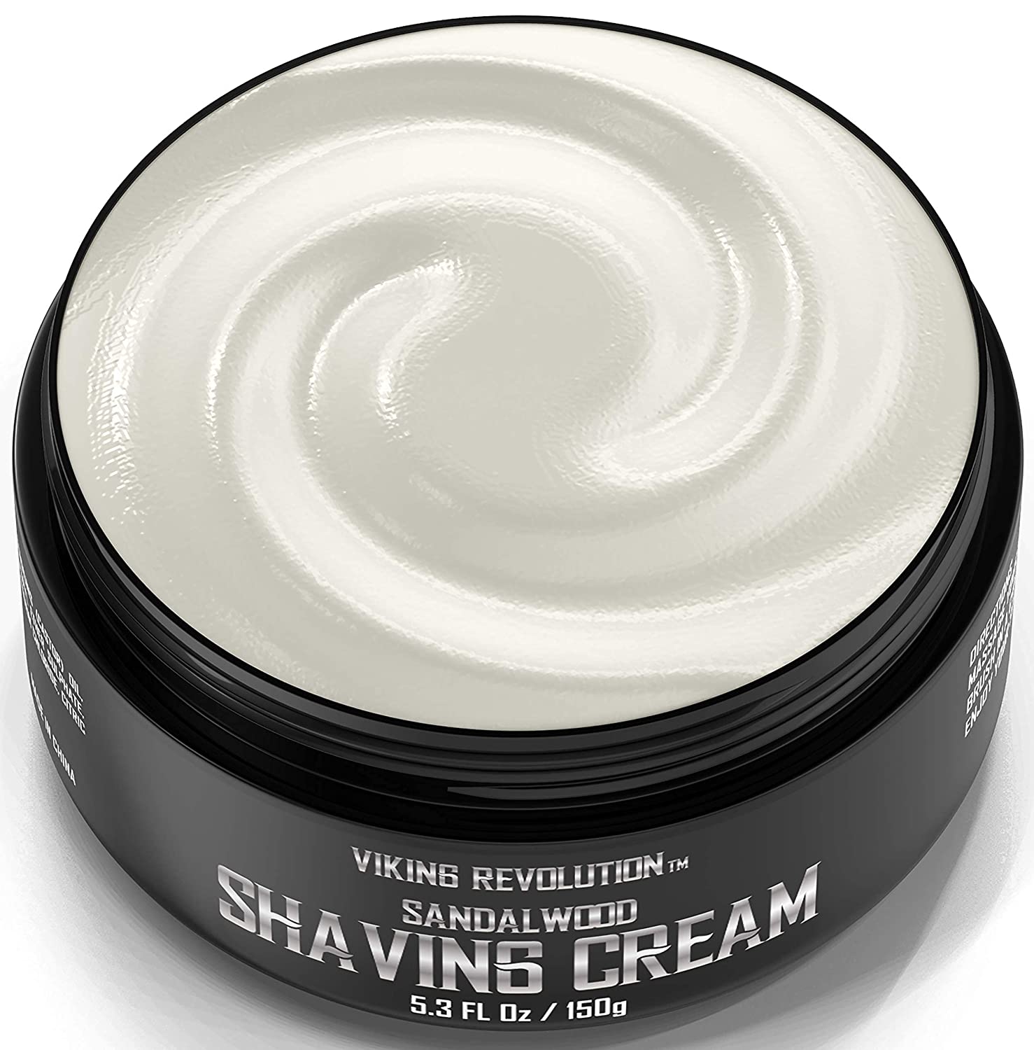 The Viking Revolution - Sandalwood Shaving Cream 5.3oz comes in a black container with a swirl pattern and is perfect for sensitive skin, enriched with natural sandalwood oils to ensure a smooth shave every time.