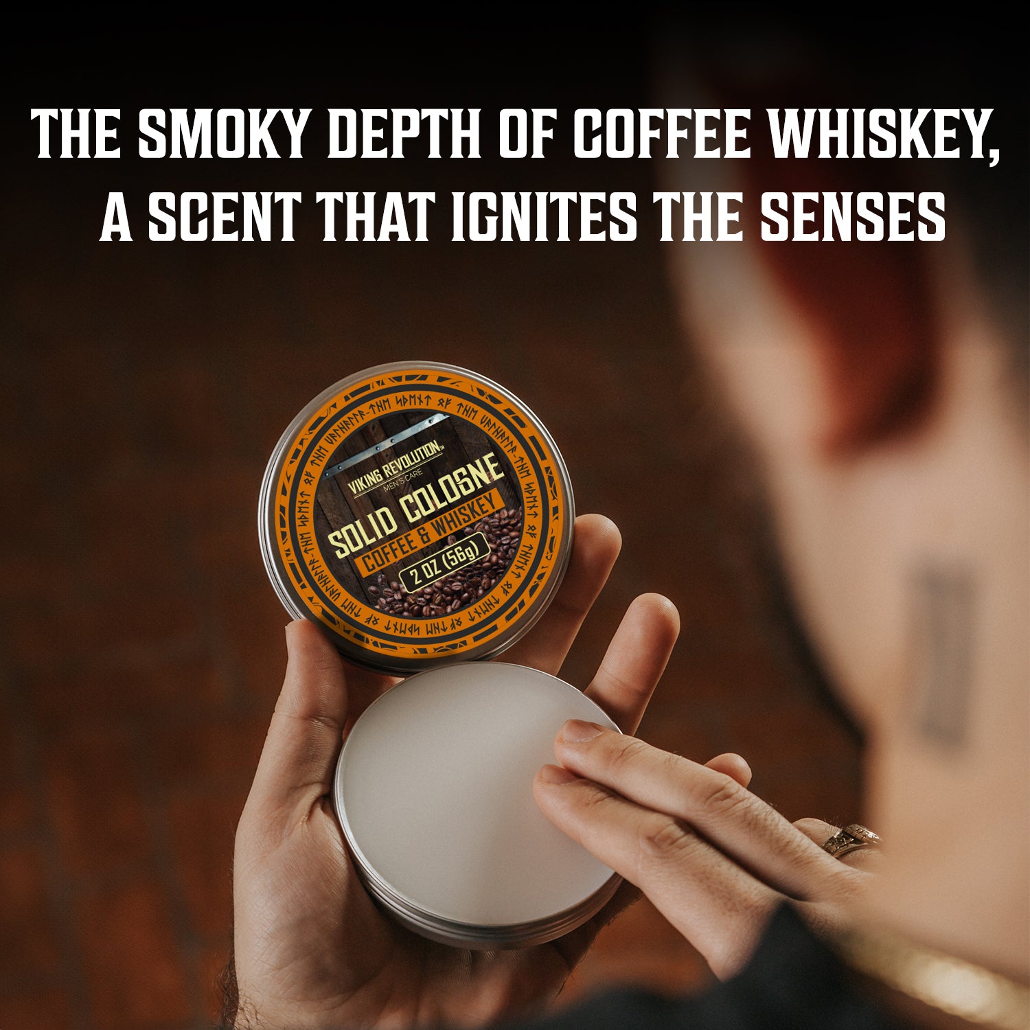 A person opens Coffee & Whiskey Mens Solid Cologne 2 Oz, the perfect rich-scented gift for men.