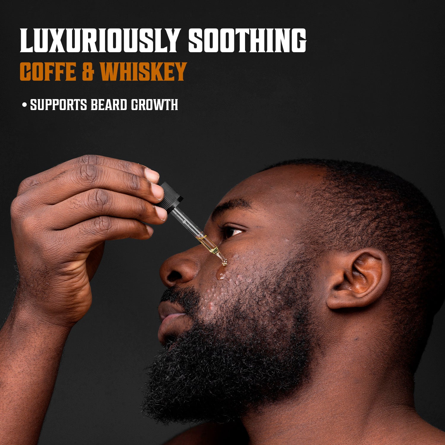 Man applying Coffee & Whiskey Beard Oil with dropper; text reads Luxuriously Soothing for beard care.