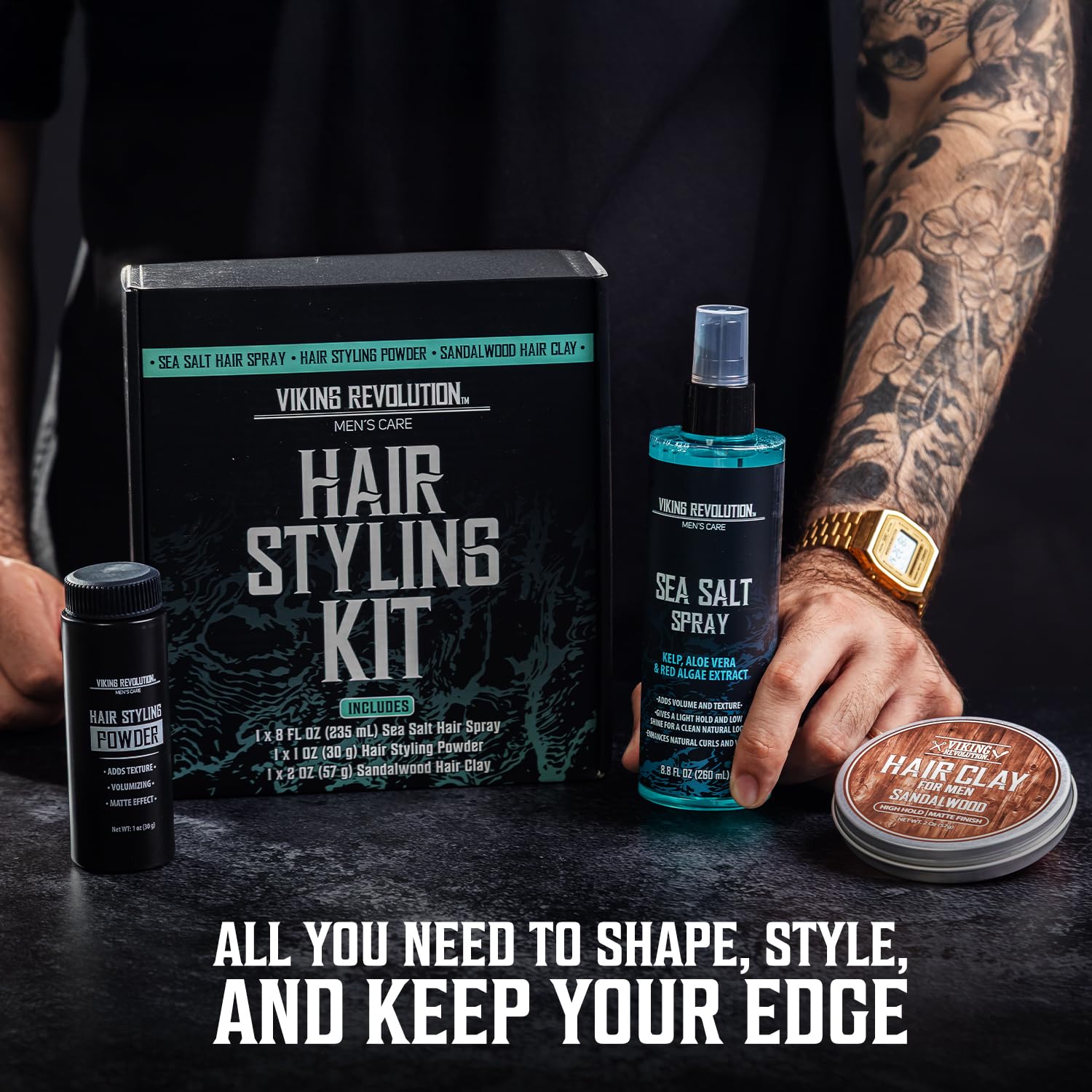 Men Hair Styling Kit: Sea Salt Spray, Sandalwood Hair Clay & Styling Powder shown by tattooed arm.