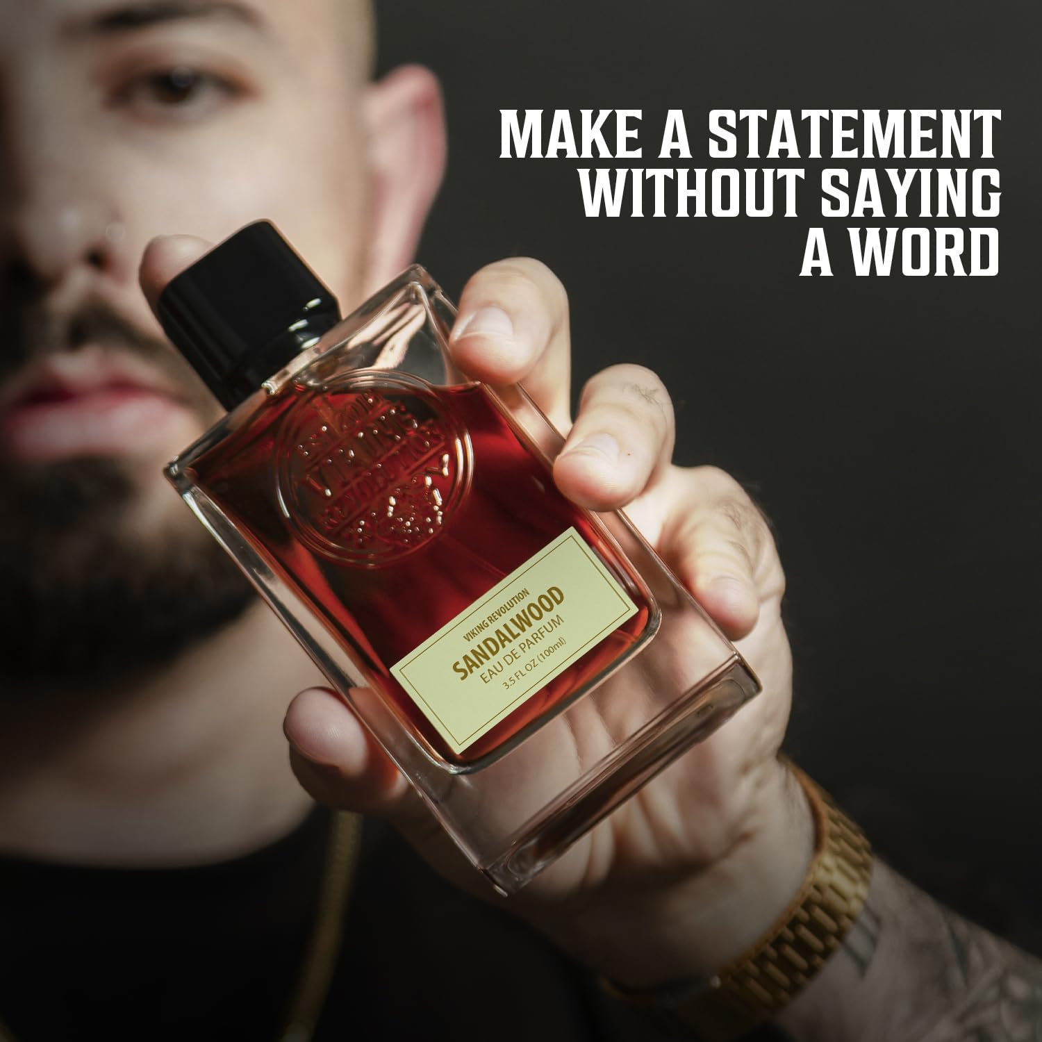 A man holds Sandalwood Perfume (3.5 Fl Oz) for men. Make a statement without saying a word.