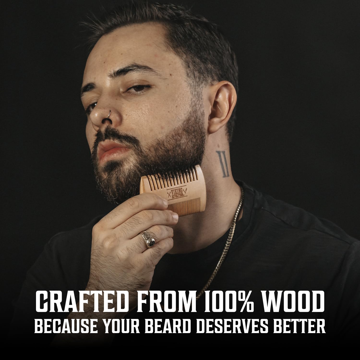 Man with a beard uses our Ultimate Spiced Vanilla Beard Kit, featuring wash, oil, balm & wooden comb.