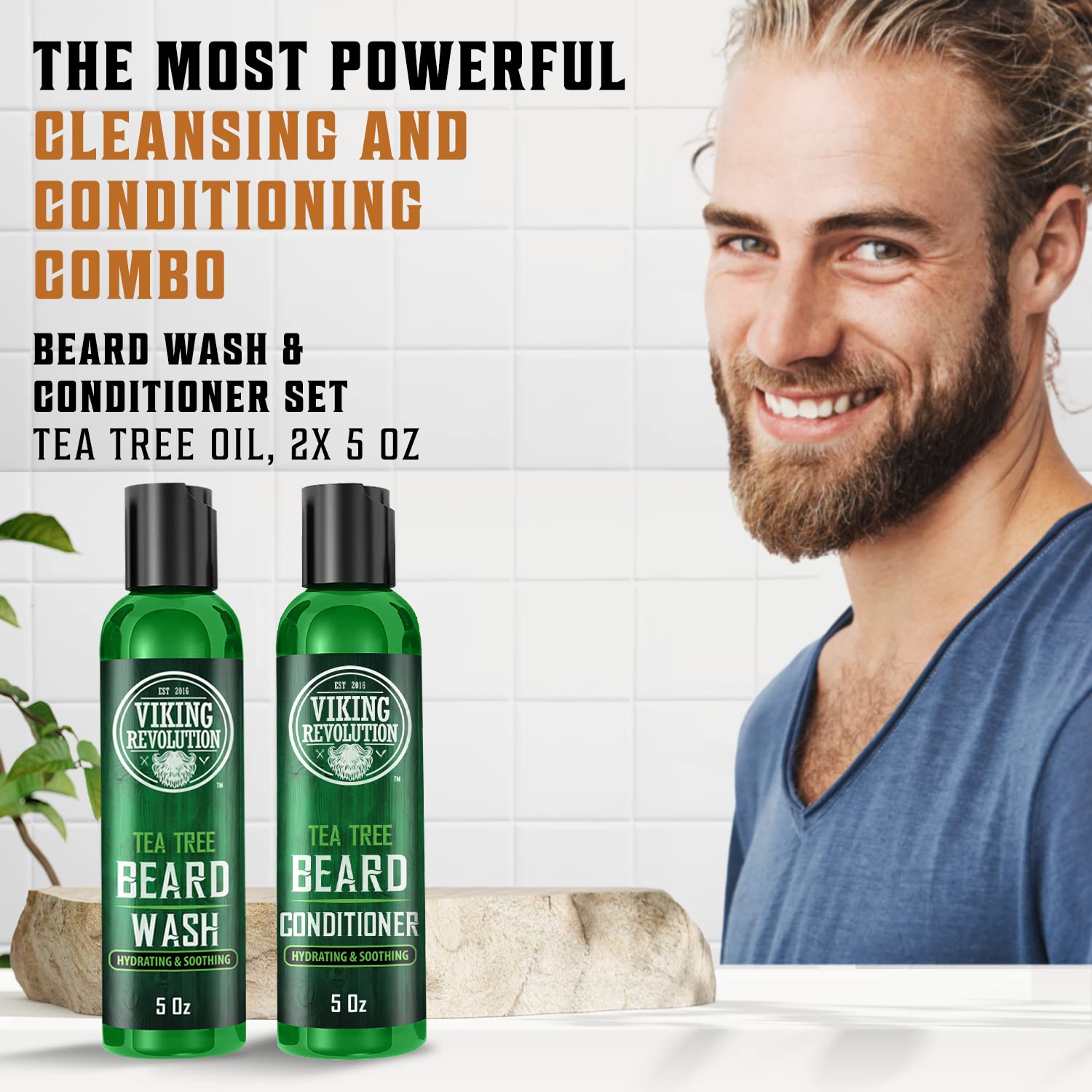 Man smiling by Tea Tree Beard Wash & Conditioner 5oz bottles, embracing natural ingredients.