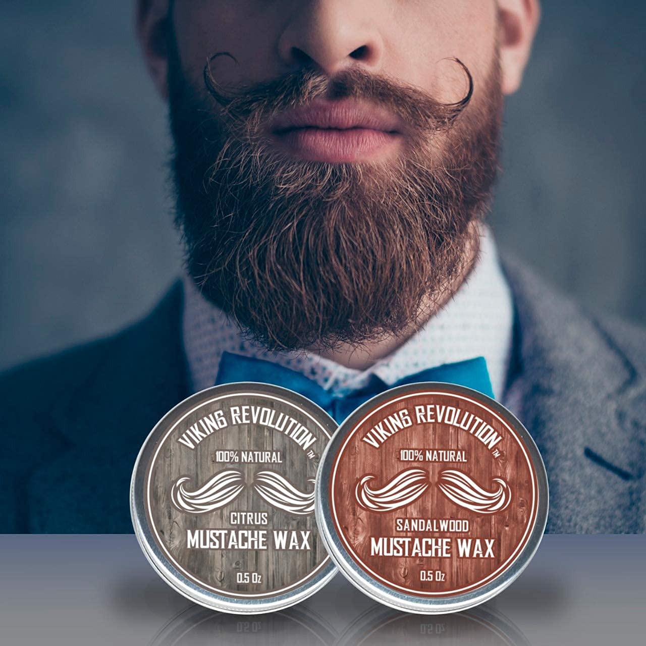 Man with styled facial hair, two tins of Citrus & Sandalwood Mustache Wax - 2 Pack in front.