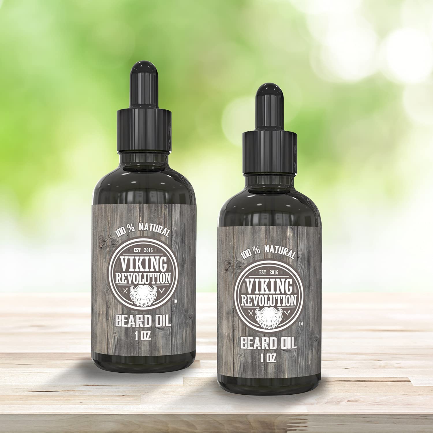 Two bottles of Unscented Beard Oil - 2 Pack on wood, set against a blurred green background.