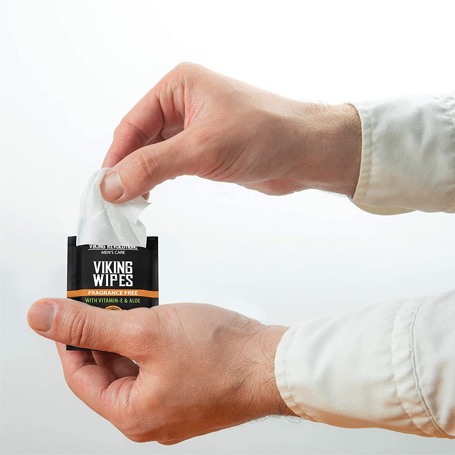 Hands pulling a biodegradable wipe from a Flushable Wet Wipes for Adults Unscented - 30 Pack.