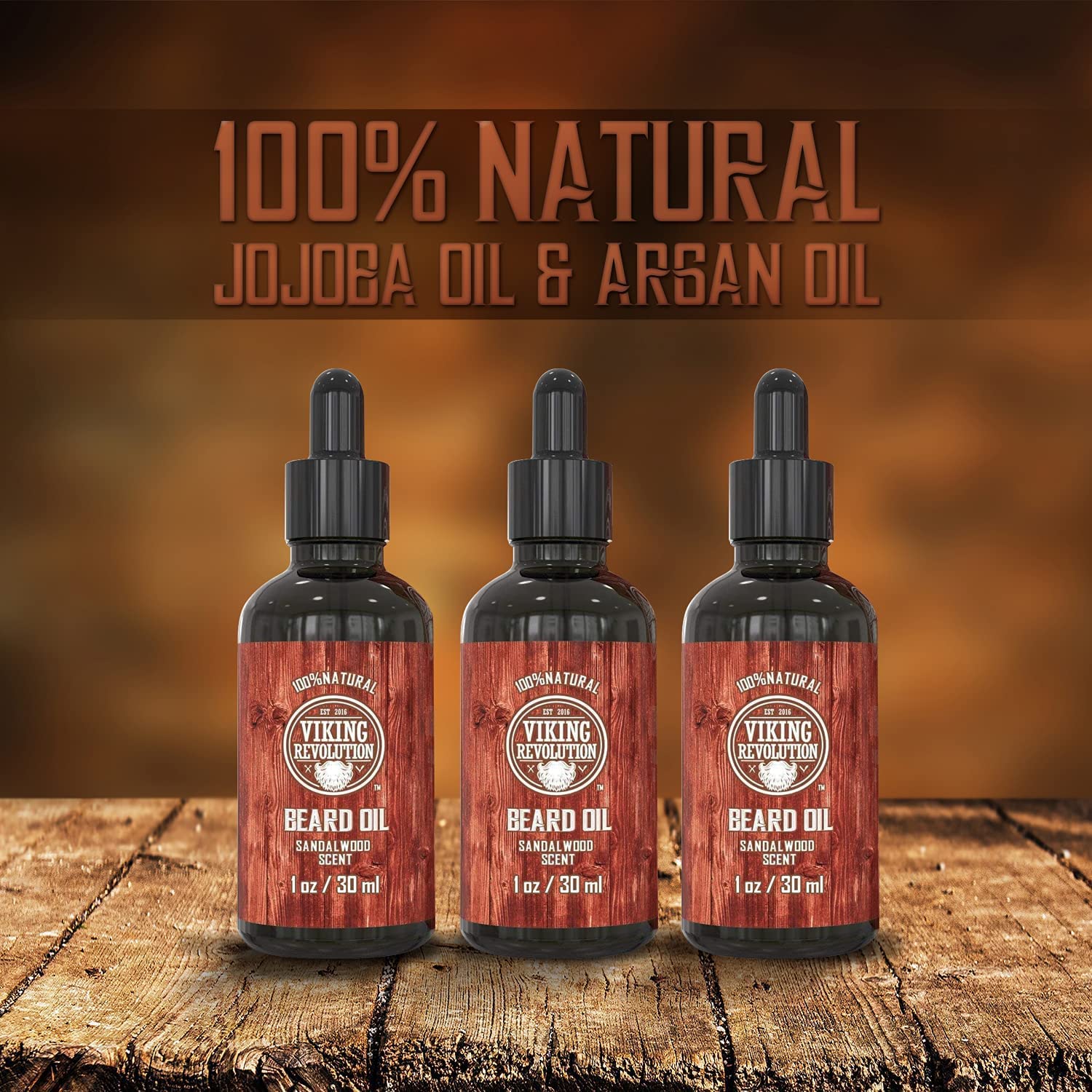 With a wooden backdrop, the Sandalwood Beard Oil - 3 Pack pledges to manage unruly facial hair. Each bottle, crafted with 100% natural ingredients, exudes a luxurious Sandalwood fragrance.