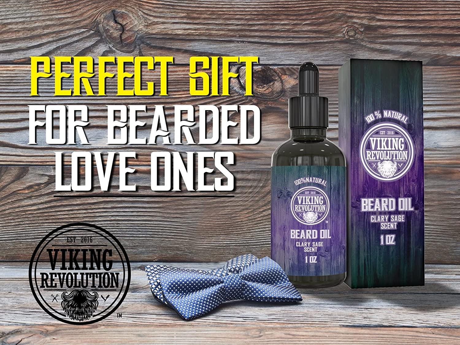 Clary Sage Beard Oil bottle and box with a bow tie on a wooden background. Infused with organic oils for a nourishing touch. Text: Perfect Gift for Bearded Loved Ones.