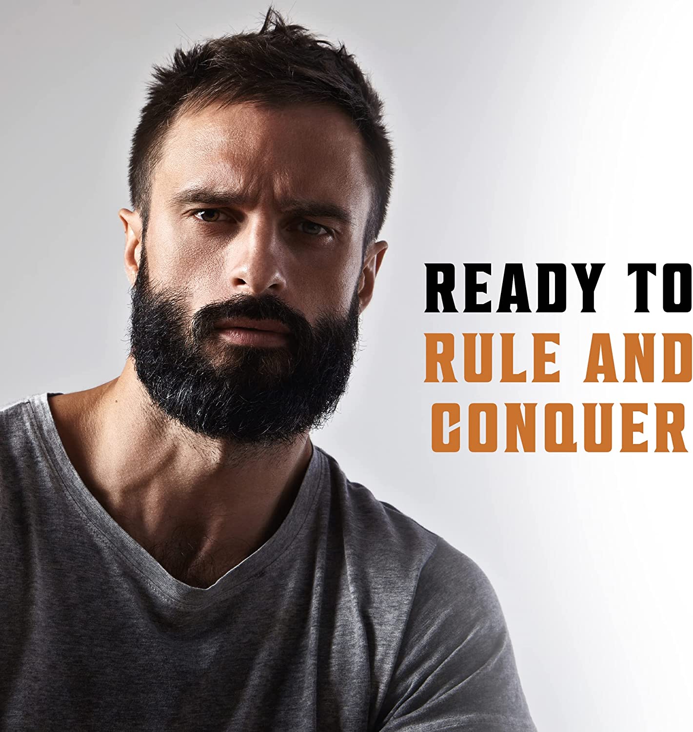 A man with a beard and serious expression stands beside the text: READY TO RULE AND CONQUER. His confidence underscores the secret to his strength—using the Peppermint & Eucalyptus Beard Wash & Conditioner Set - 5oz for protection against beard dandruff.