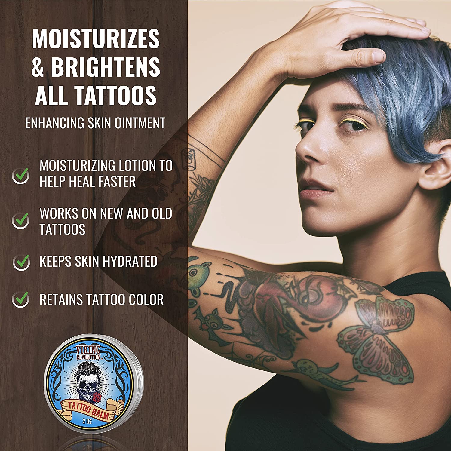 A person with tattoos, blue hair, and a black tank top poses confidently next to an advertisement for Tattoo Care Balm - 2 Pack, which is designed to moisturize and soothe the skin.