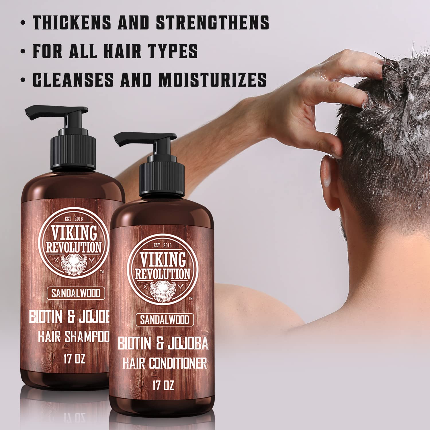 The Sandalwood Shampoo and Conditioner Set (17 Oz) features bottles with an image of a man washing his hair, and text that highlights the benefits of biotin for thinning hair along with other nourishing ingredients.