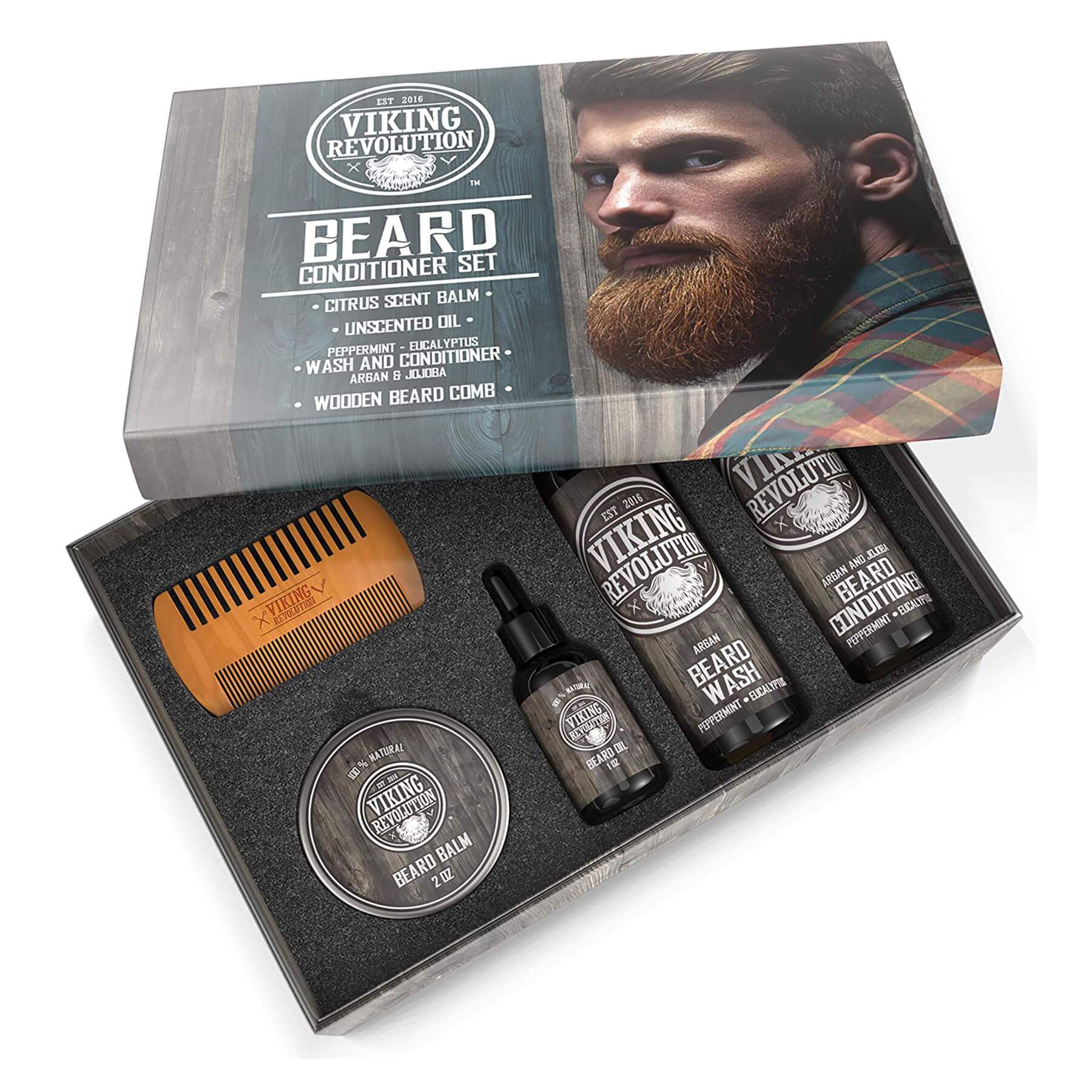 The Beard Grooming Kit includes essential items for beard care, such as a comb, sandalwood-scented oils, wash, and balm. These are presented in a beautifully designed box featuring the image of a bearded man.