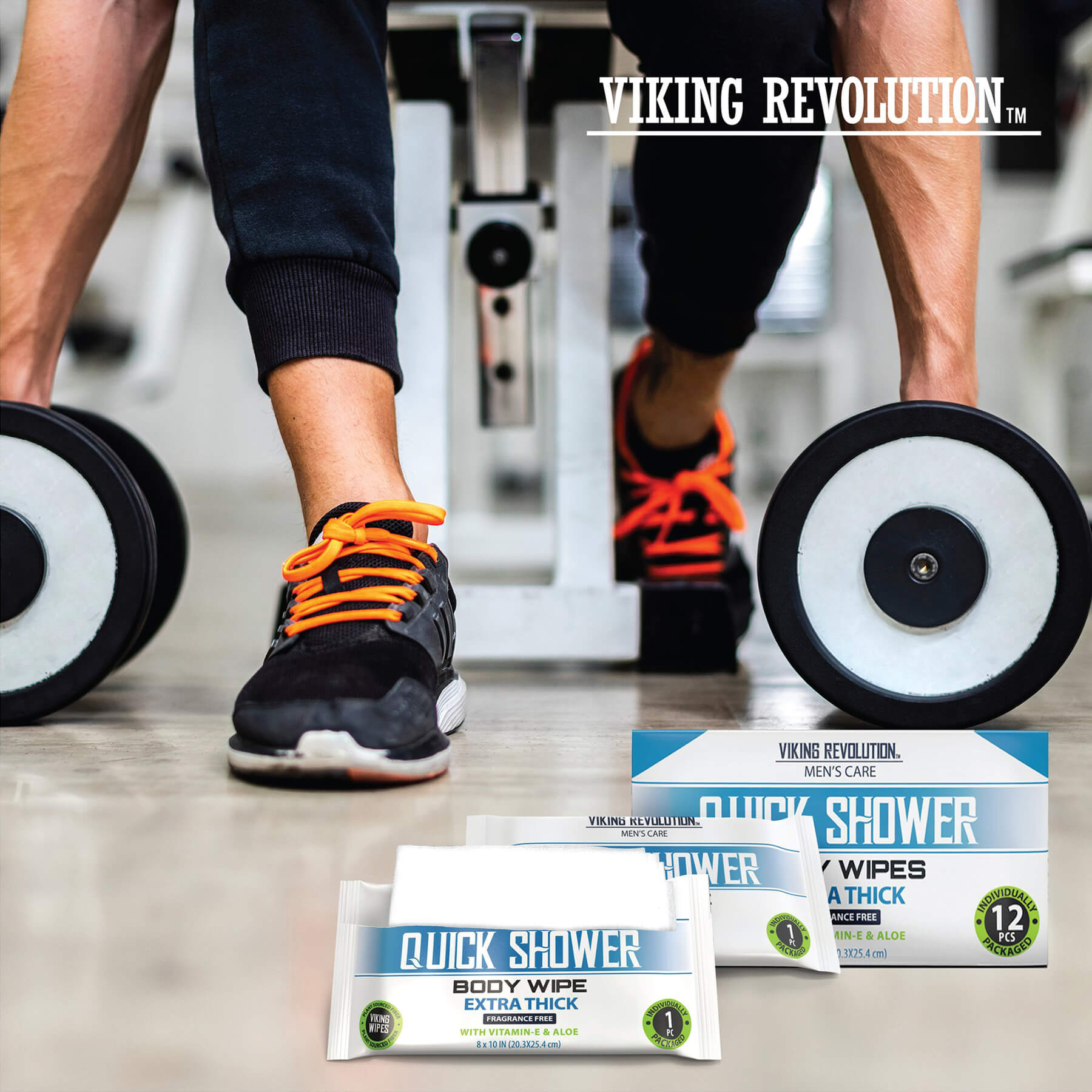 Person in gym with black sneakers holding weights; Body Wipes w/ Vitamin E & Aloe - 12 Pack in foreground.