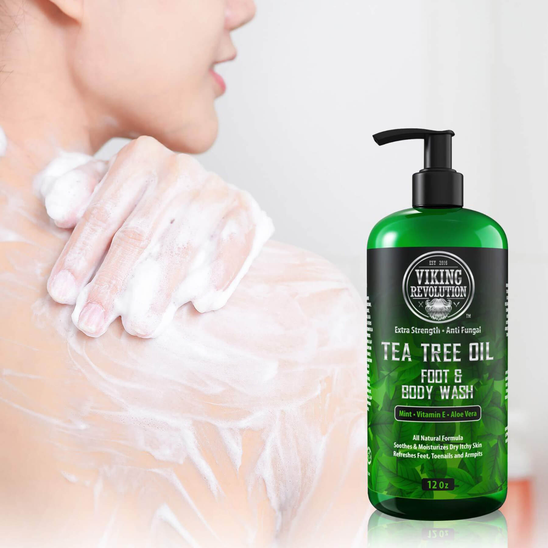 A person uses the Tea Tree Oil Body Wash, shown in a green bottle with a pump in the foreground. This natural skin treatment is renowned for its antifungal properties, delivering a refreshing cleanse to both your feet and body.