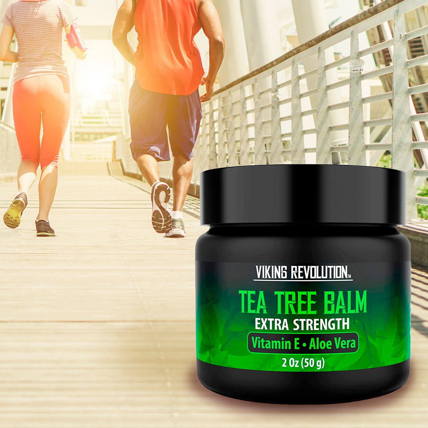 Tea Tree Oil Cream container, featuring fast results, with two people jogging on a bridge in the background.