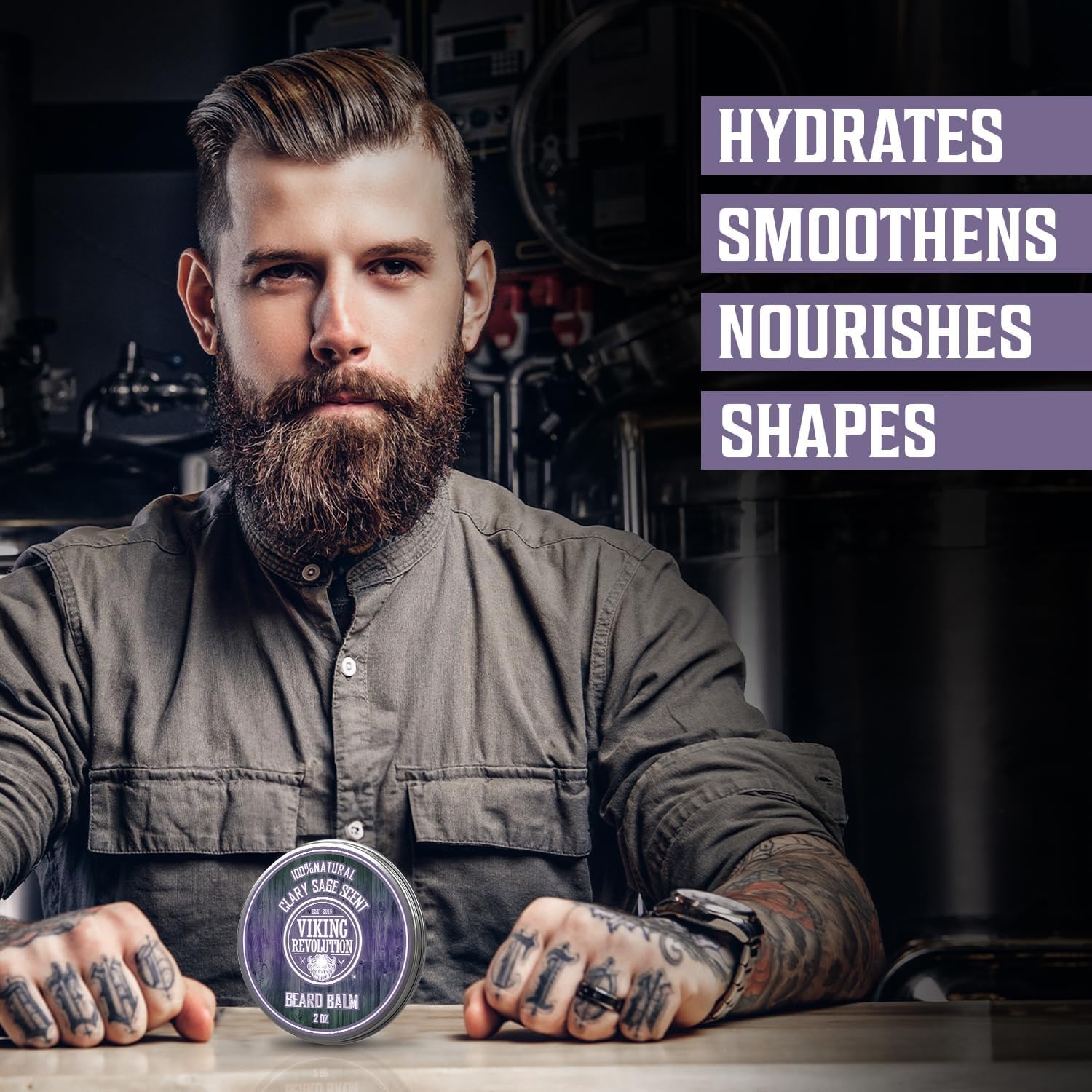 Tattooed man holding Clary Sage Beard Balm (2oz); hydrates, smooths, nourishes, fights beard dandruff.