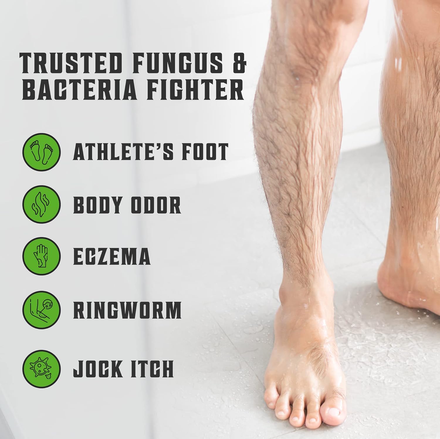 Bare legs on a wet bathroom floor show eczema and athlete's foot; try Tea Tree Oil Body Wash (12oz).
