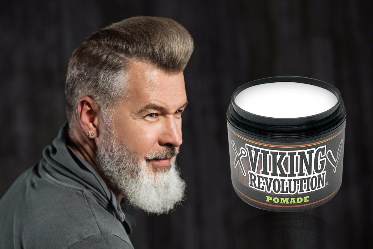 Smiling man with styled hair and beard beside a jar of Medium Hold Hair Pomade (4oz).