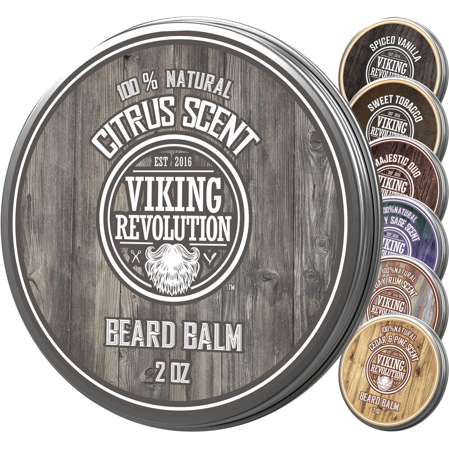 A 2oz round tin of Beard Balm - Citrus with other beard grooming tins stacked beside it.