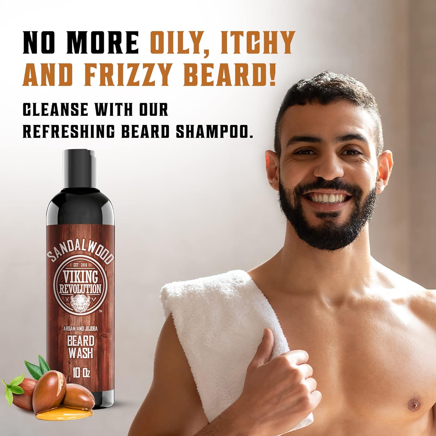 Smiling man with towel holds beard, next to Sandalwood Beard Wash & Conditioner Set (10oz) bottle.