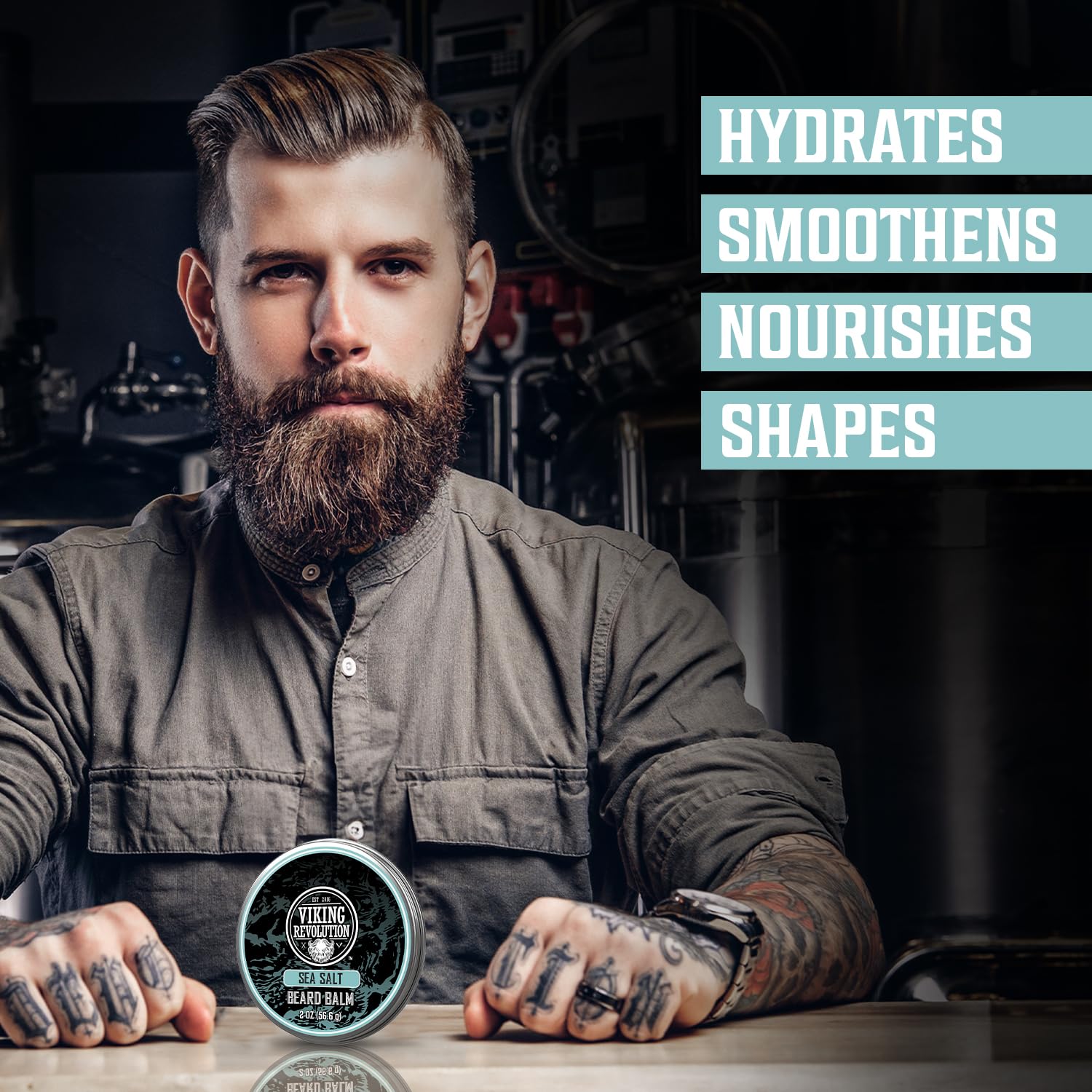 Man with a full beard sits at a table with Sea Salt Beard Balm (2 oz); hydrates, smoothens, shapes.