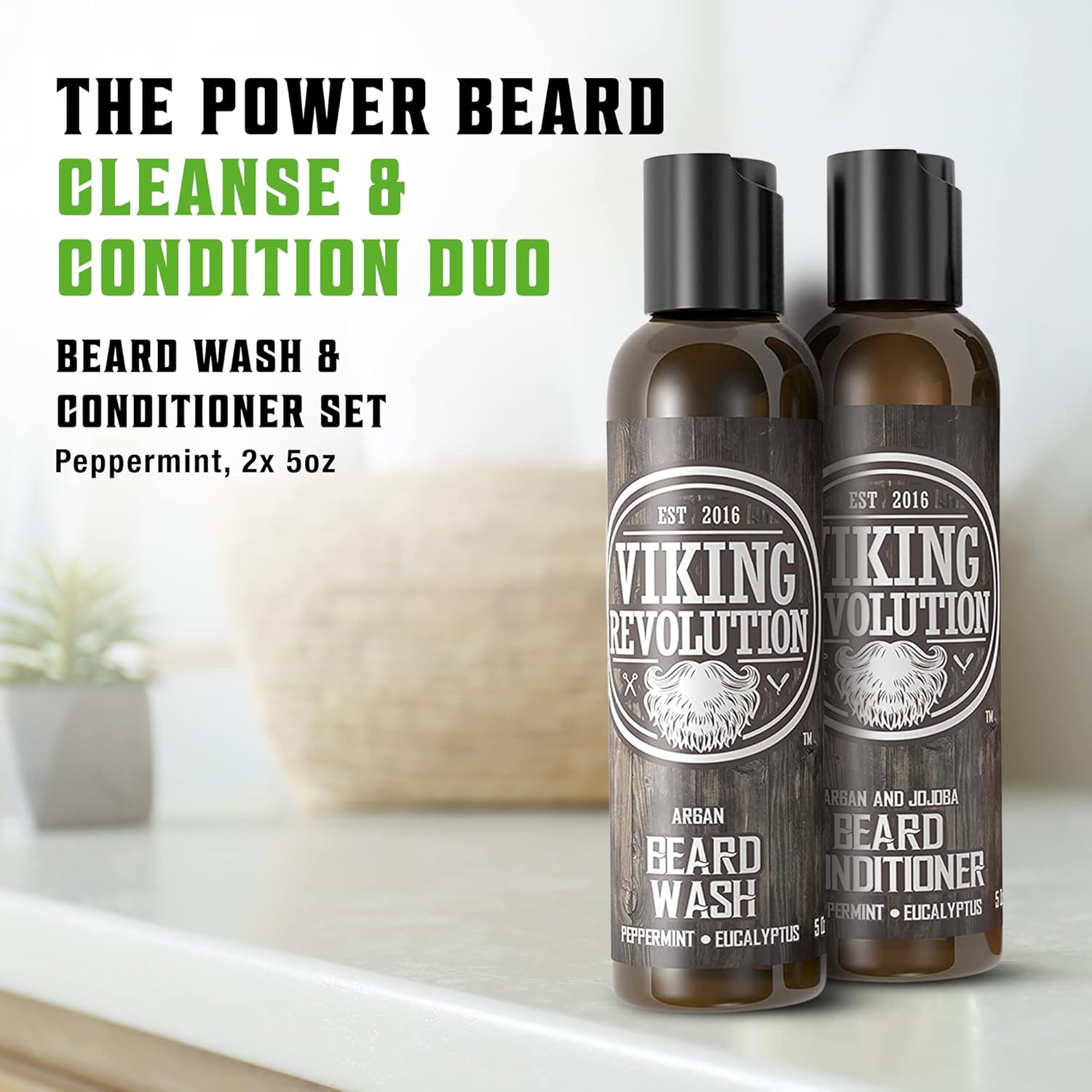 Two bottles of Beard Wash & Conditioner Set - Peppermint & Eucalyptus (5oz) on counter, plant behind.