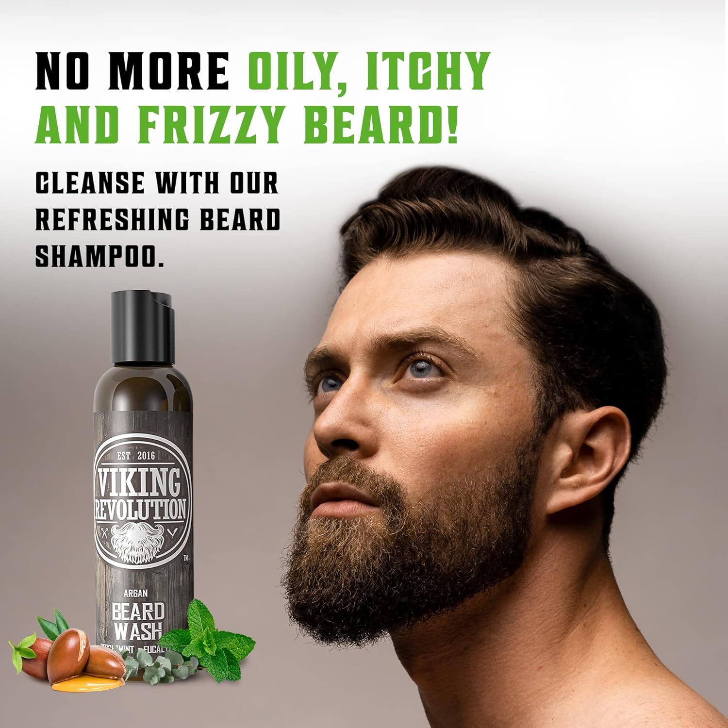 A bearded man looks up; Beard Wash & Conditioner Set - Peppermint & Eucalyptus (5oz) beside him.