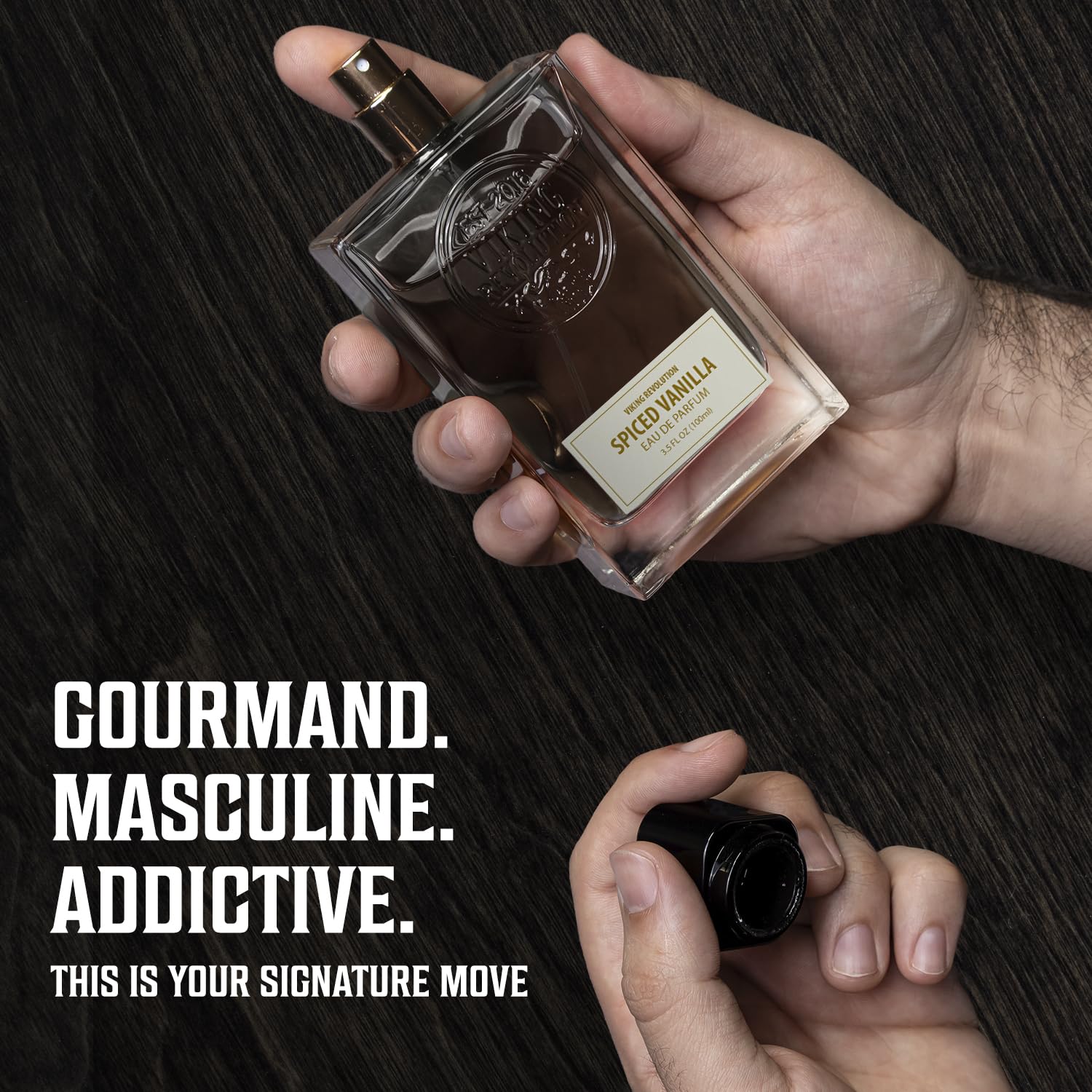A hand holds a Spiced Vanilla Perfume (3.5 fl oz) bottle above bold, masculine fragrance details.